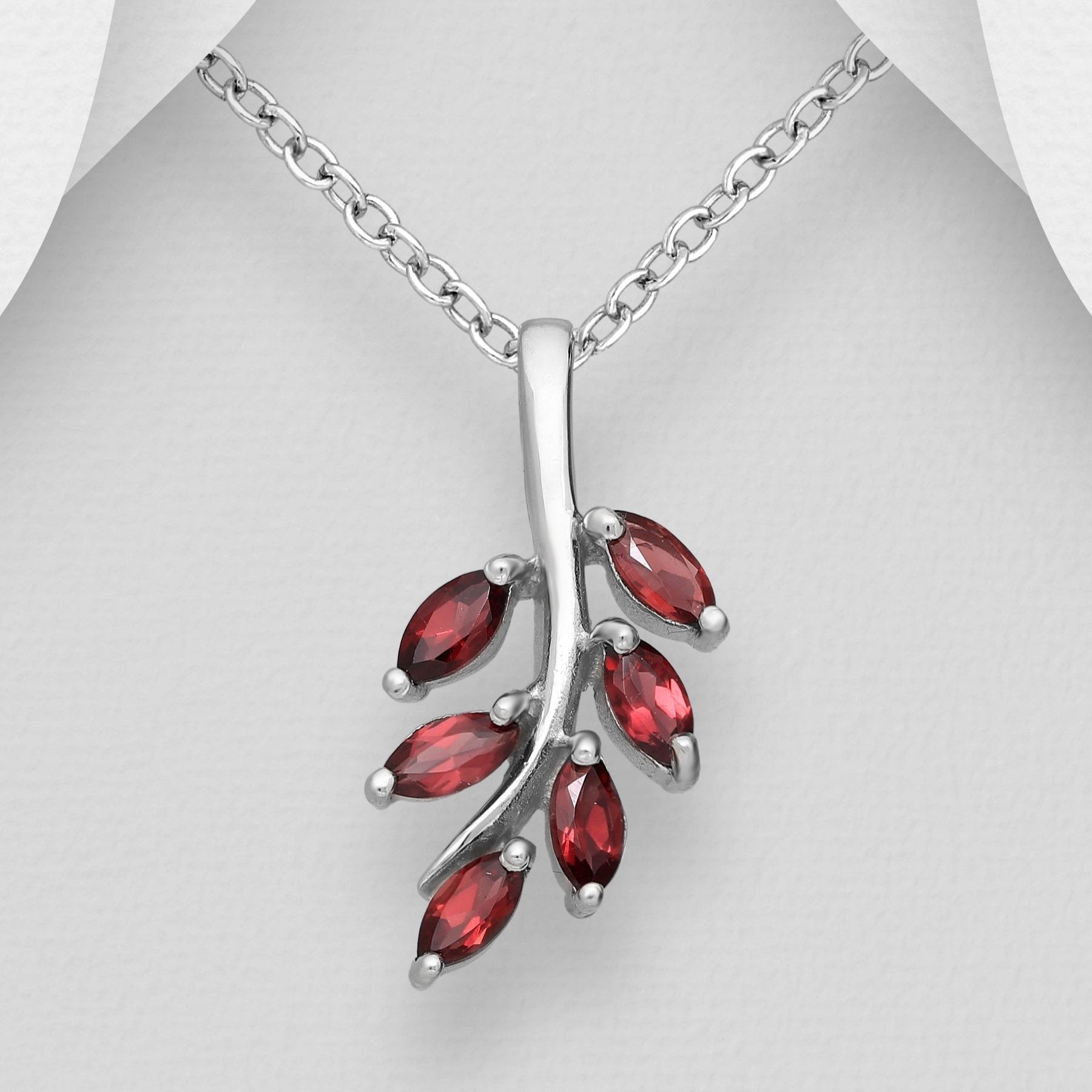 Image with Garnet Branch pendant on a chain.