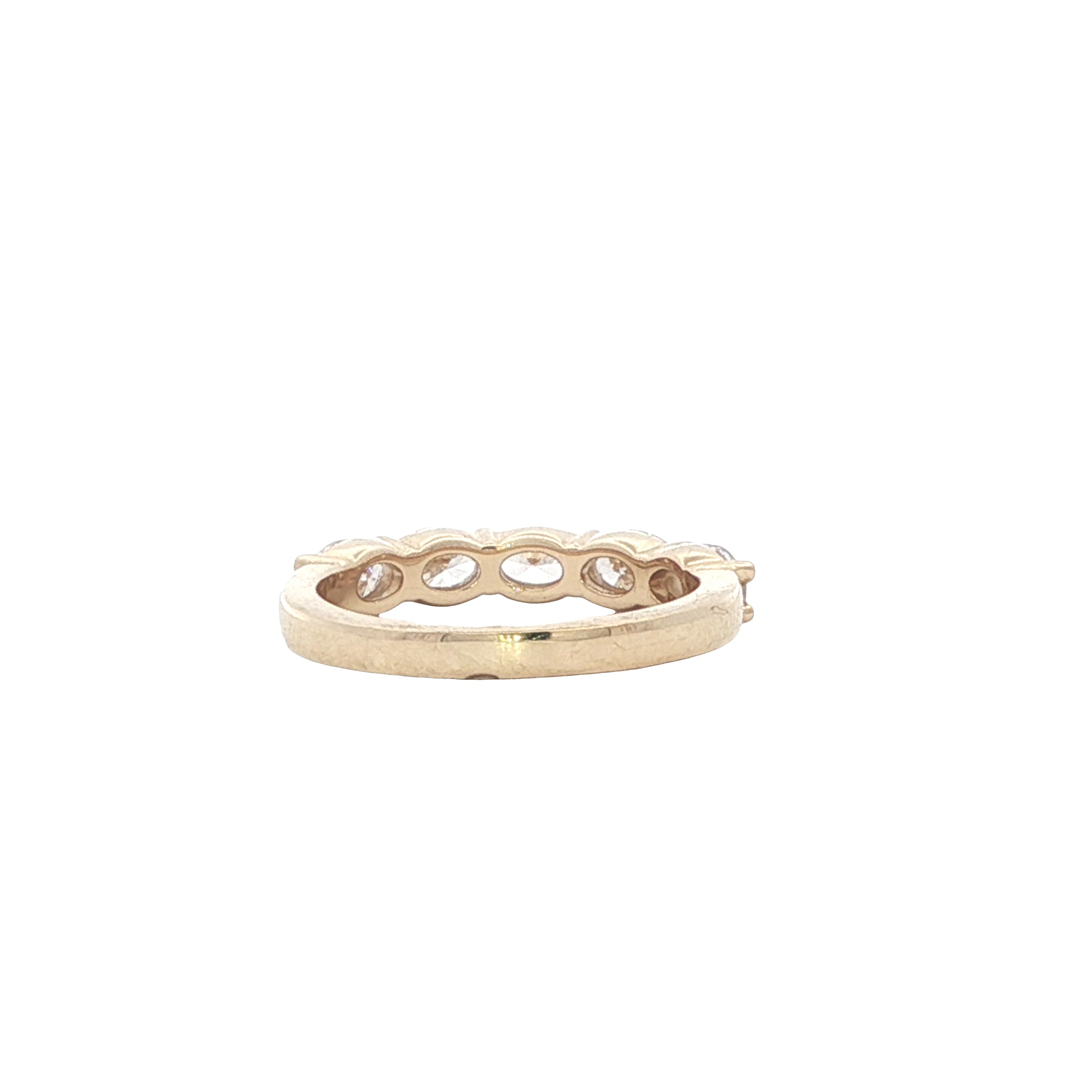 Gold ring with embedded diamonds on a white background