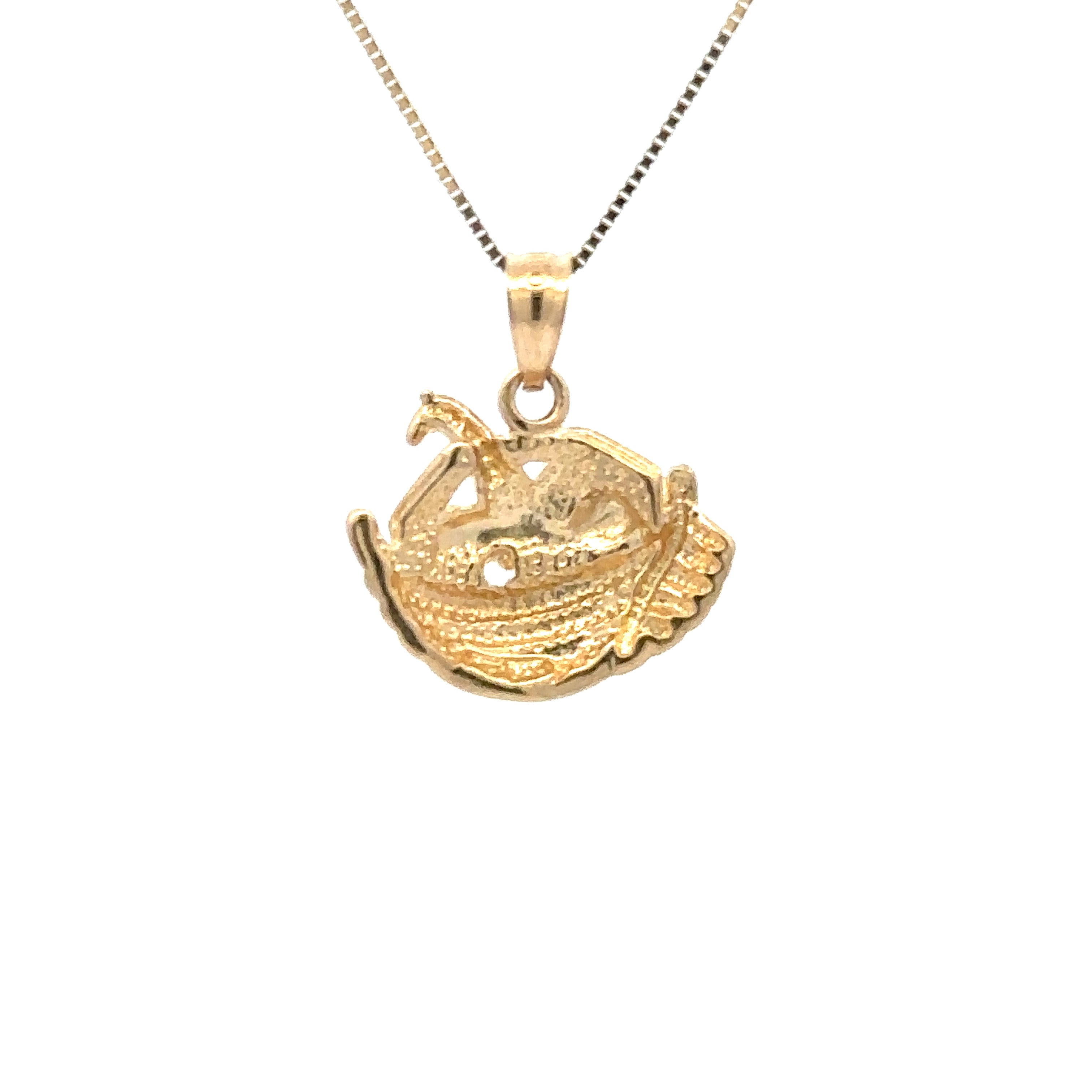 Gold necklace with a boat-shaped pendant on a white background