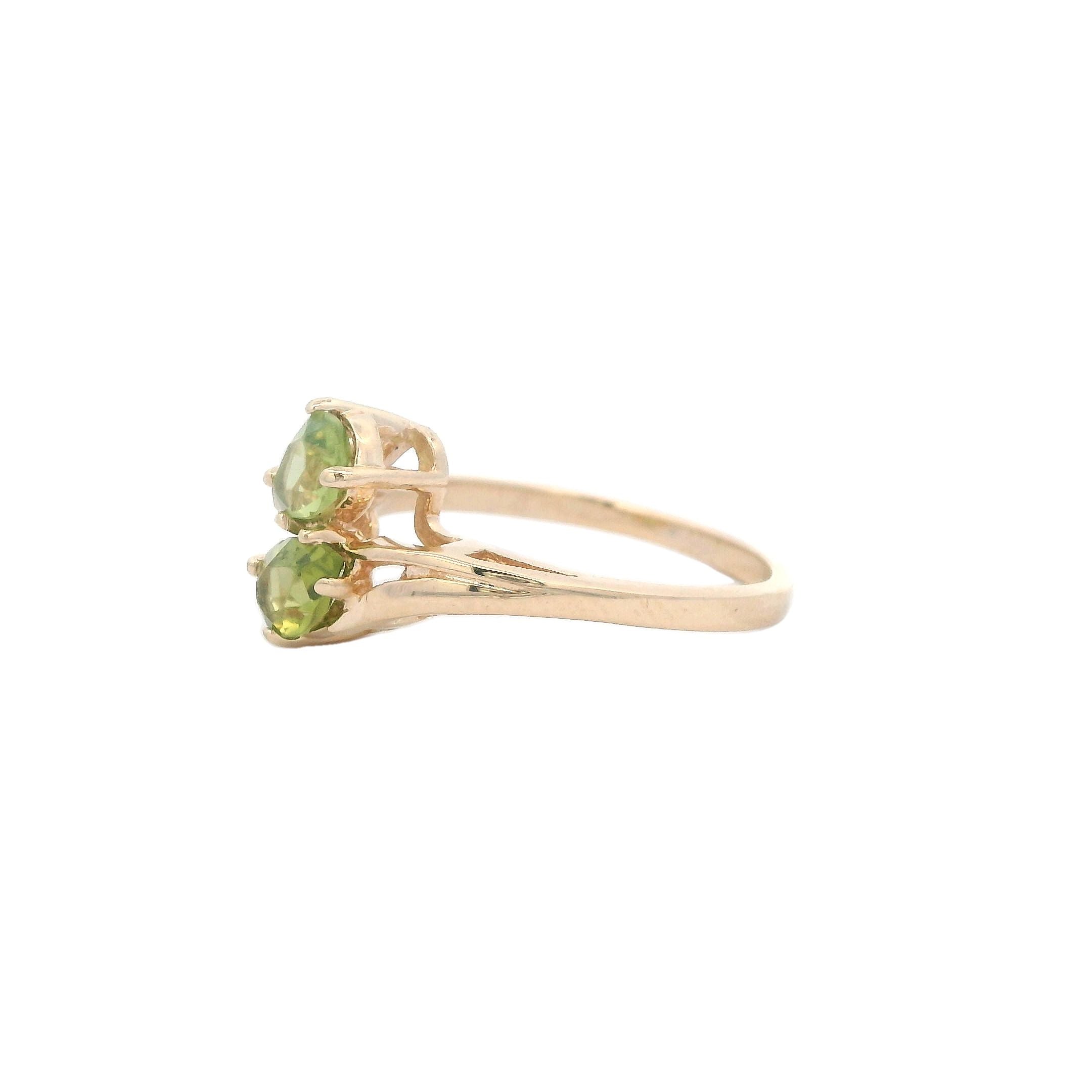 Estate Collection: 14K Yellow Gold 2-Stone Pear-Cut Peridot Bypass Ring