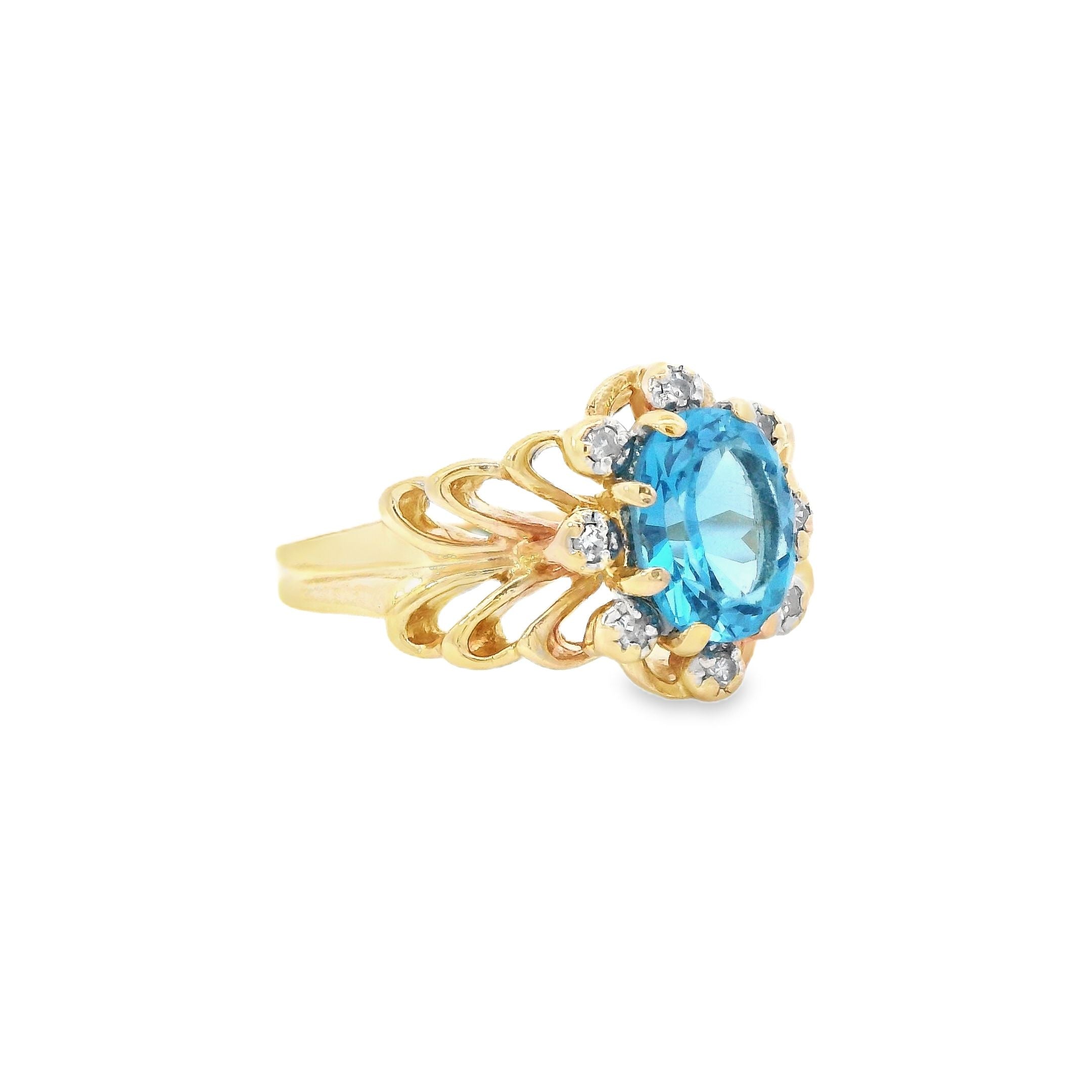 Estate Collection: 10K Yellow Gold Ornate Oval Blue Topaz & Diamond Ring