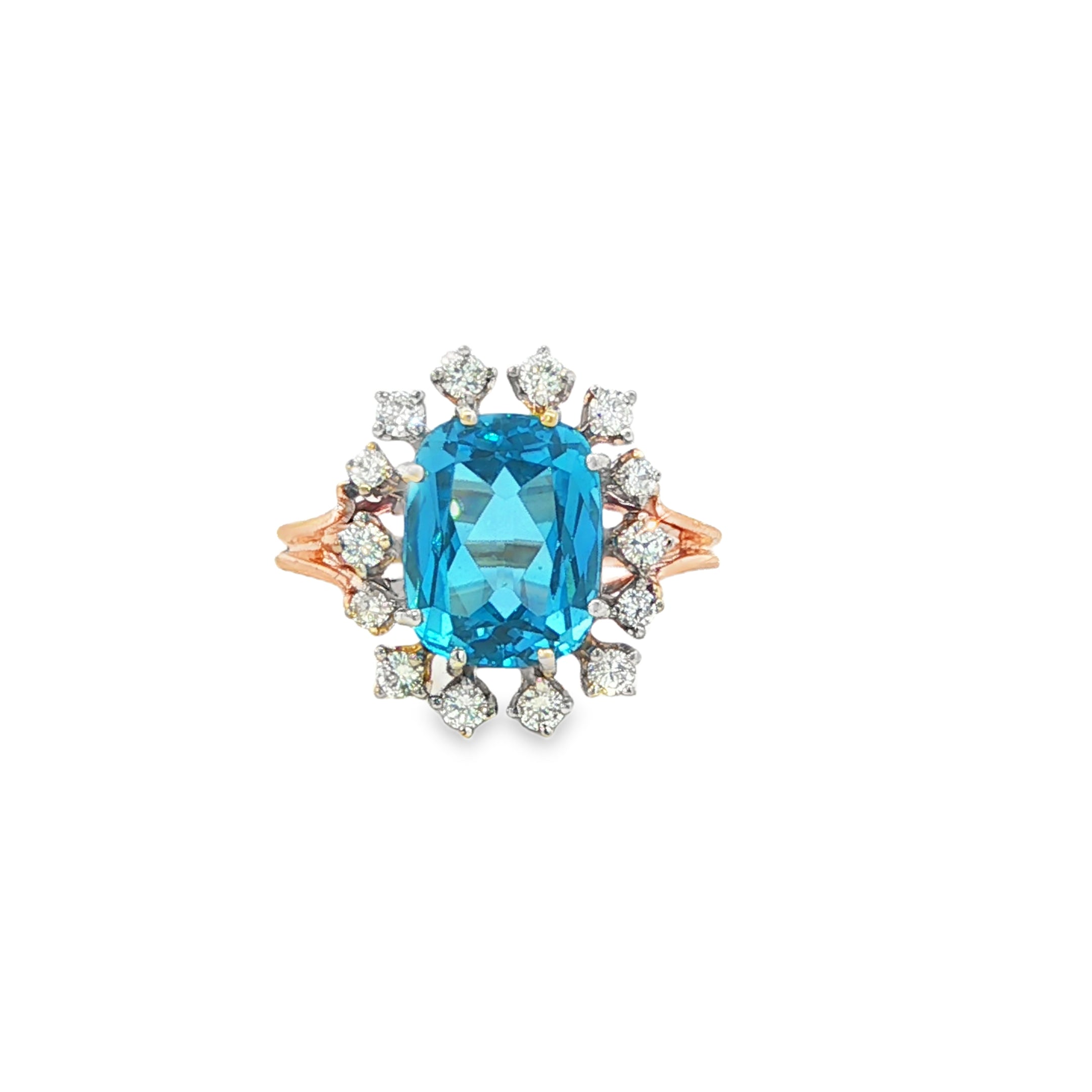 Estate Collection: 14K Yellow Gold Elongated Cushion Blue Topaz and Diamond Halo Cocktail Ring