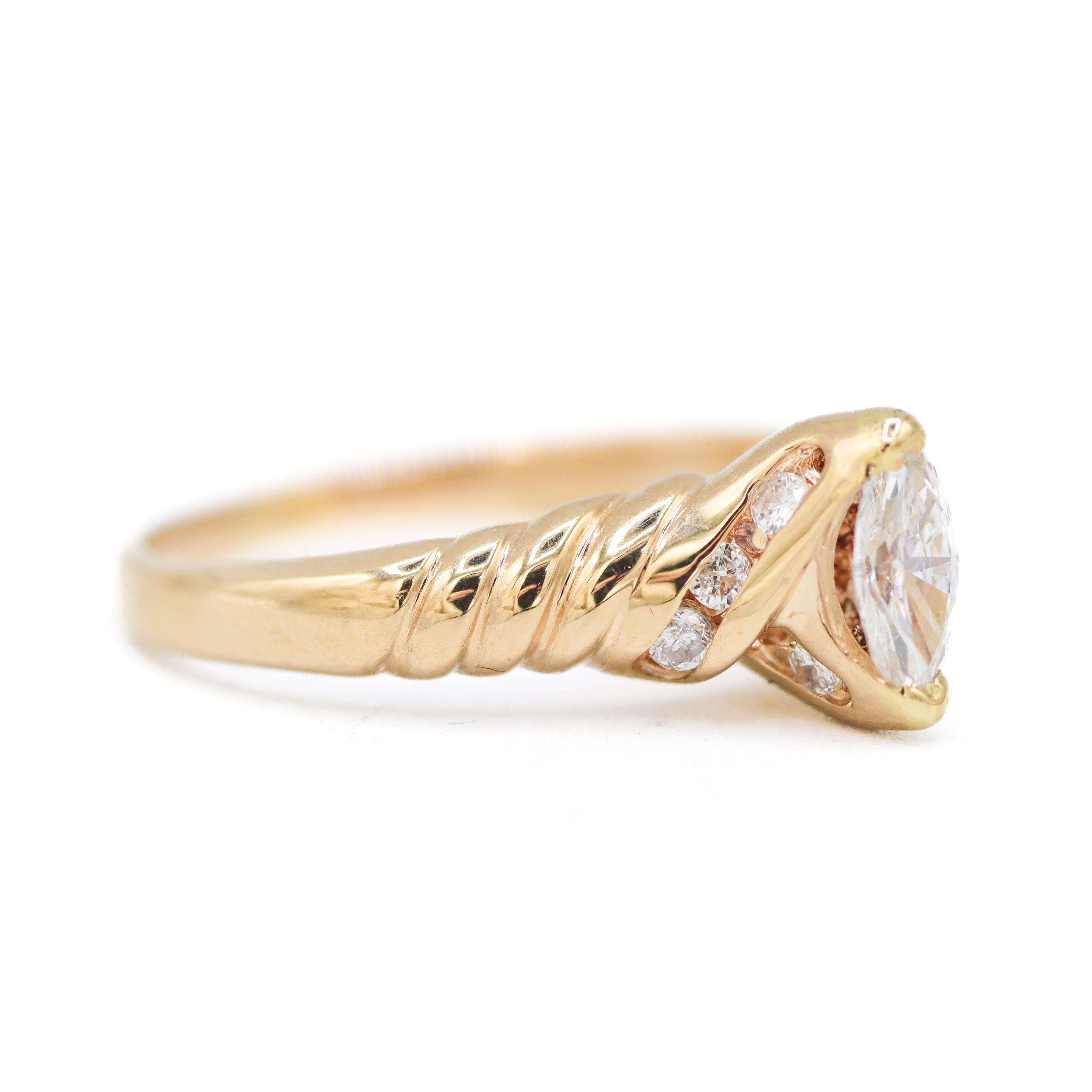 Estate Collection: 14K Yellow Gold 0.25CT. Marquise Diamond & 0.20CT. Engagement Ring Set