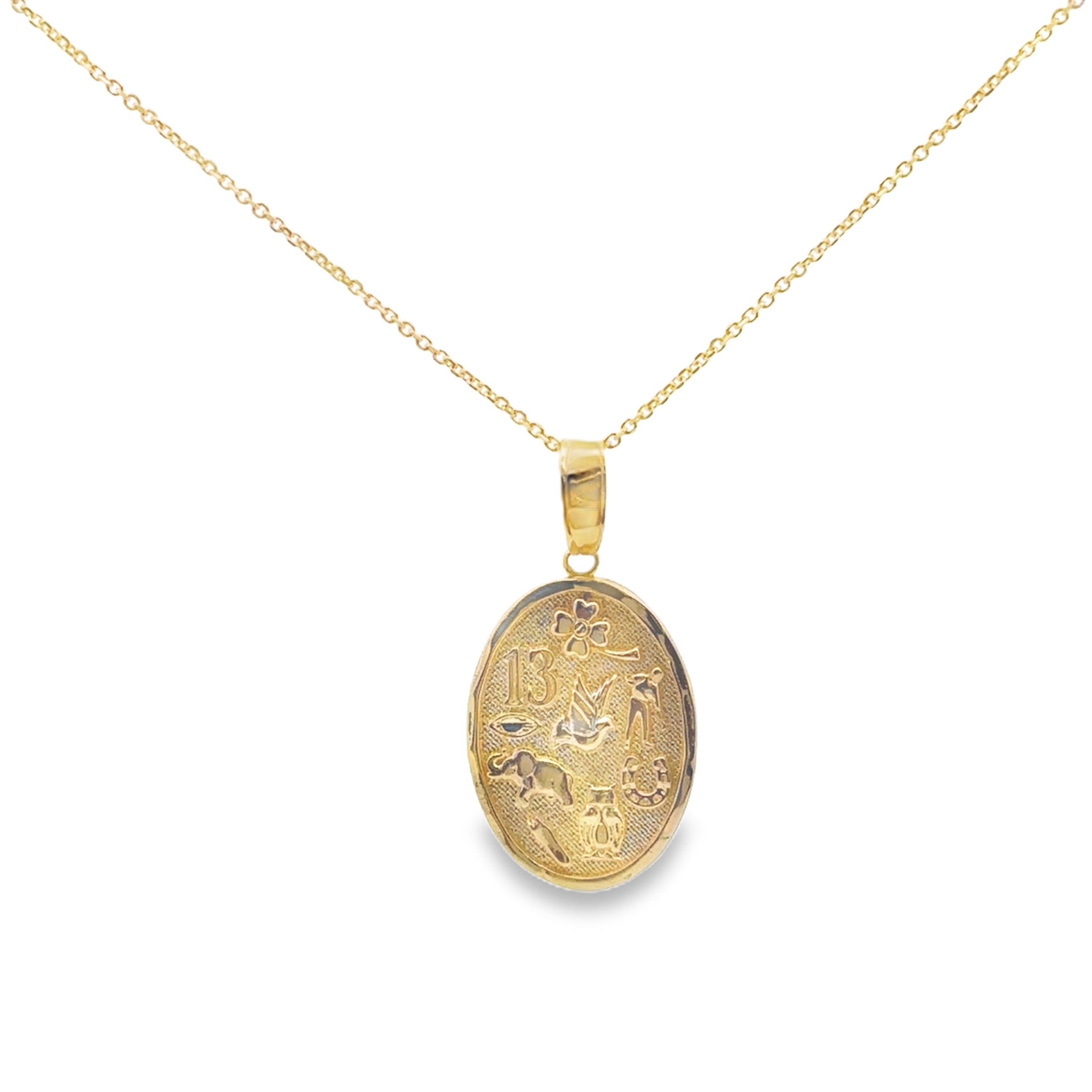 Gold necklace with a detailed pendant on a white background