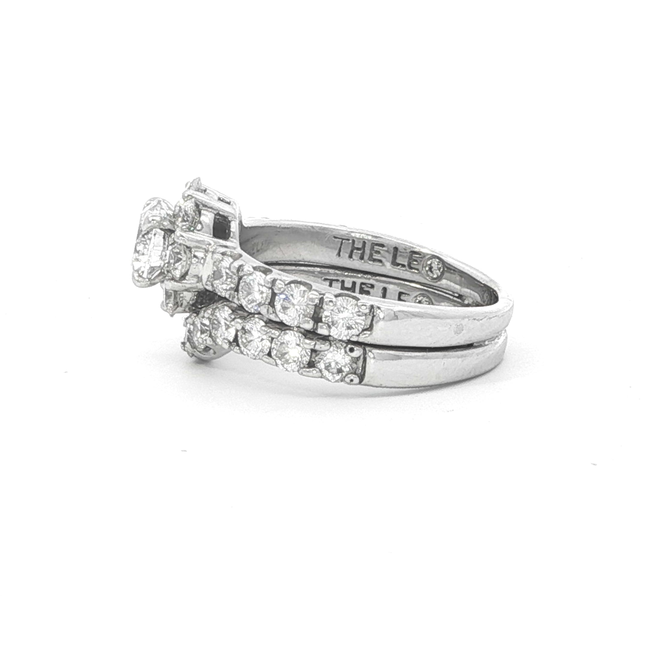 Estate Collection: 14K White Gold 2.02CTW. Leo Diamond Certified Halo Engagement Ring & Curved Wedding Band Bridal Set
