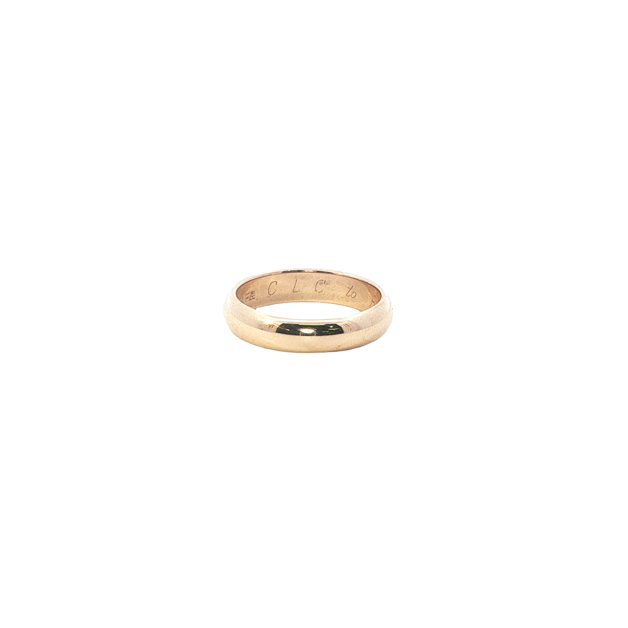 Gold ring with engraved text on a white background