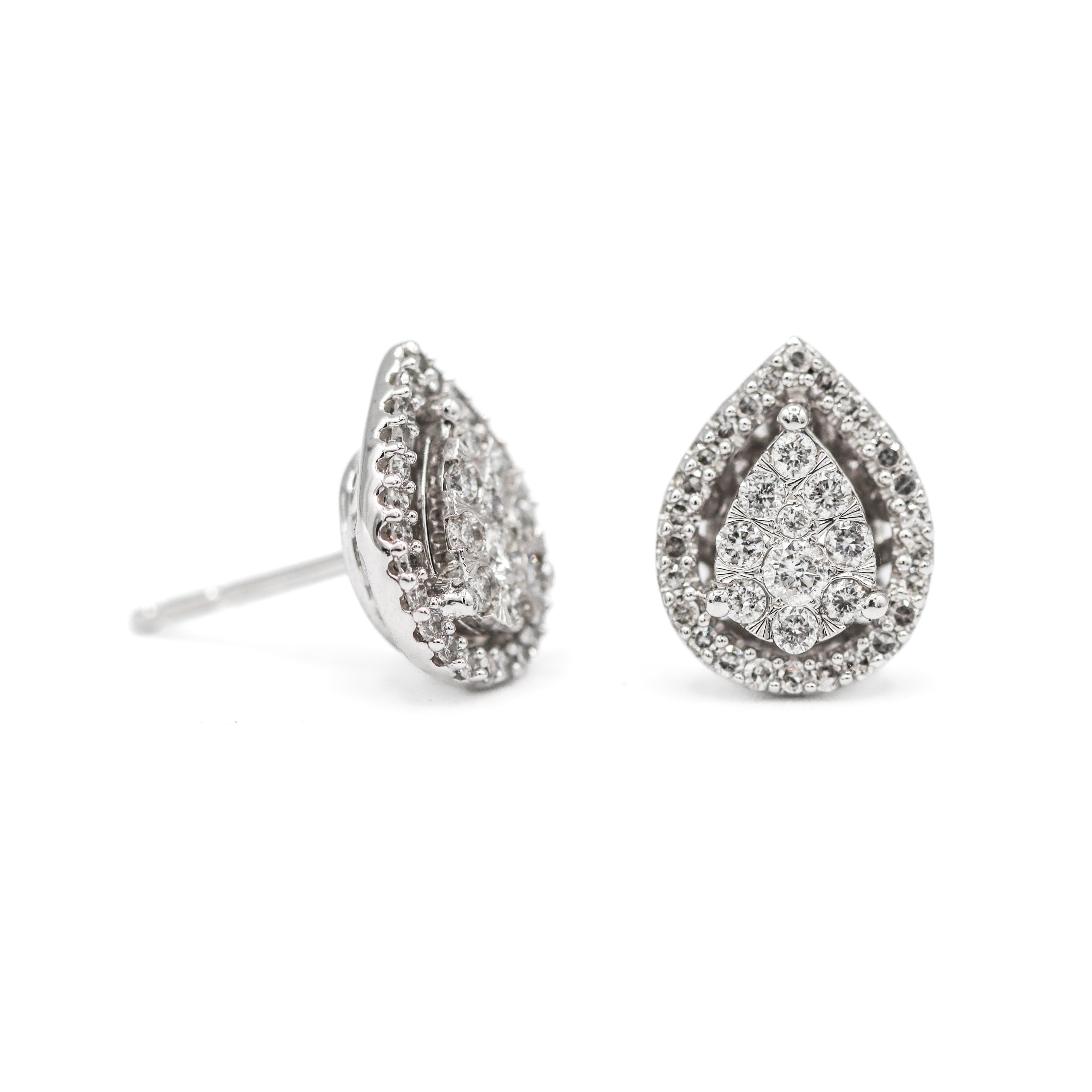 One front and one side view of 10K White Gold 1/2CT. Pear Cluster Halo Stud Earrings on a white background.
