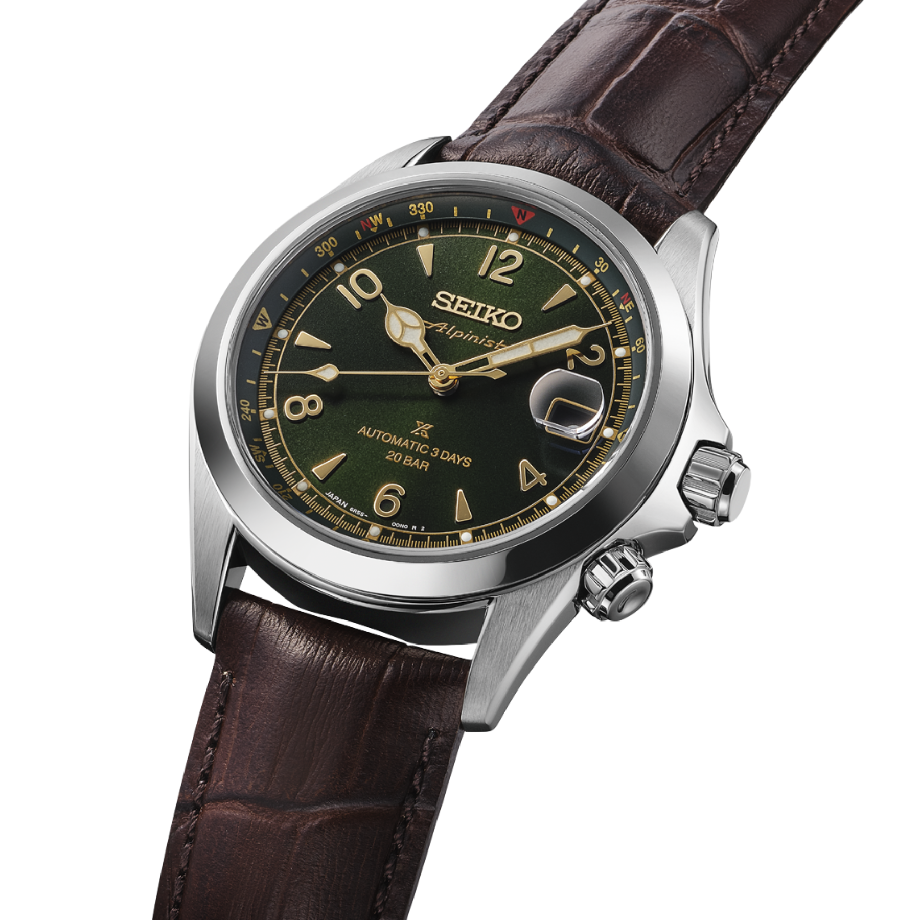 Seiko watch with brown leather strap and green dial on a white background