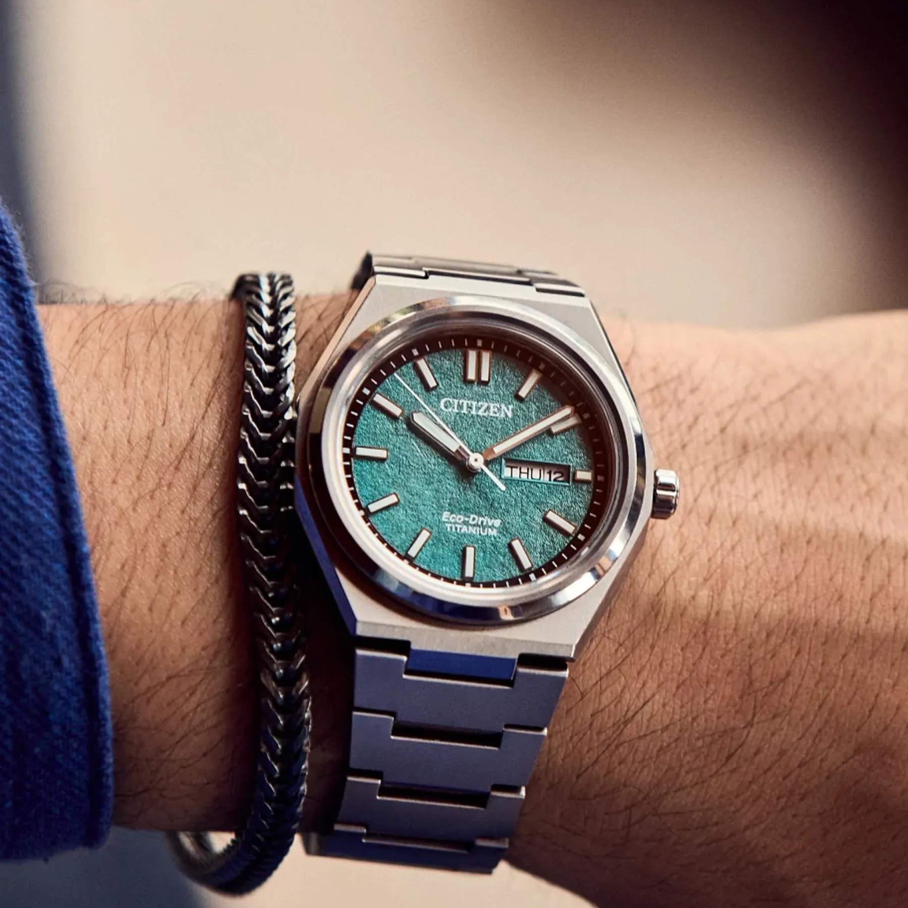 Citizen watch on a wrist with a blurred background
