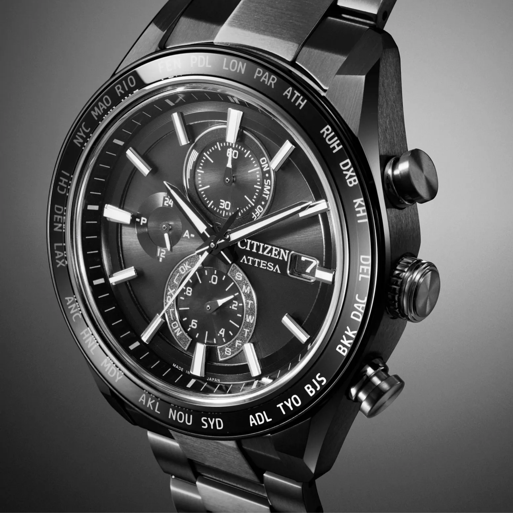 Black Citizen watch with detailed face on a gray background