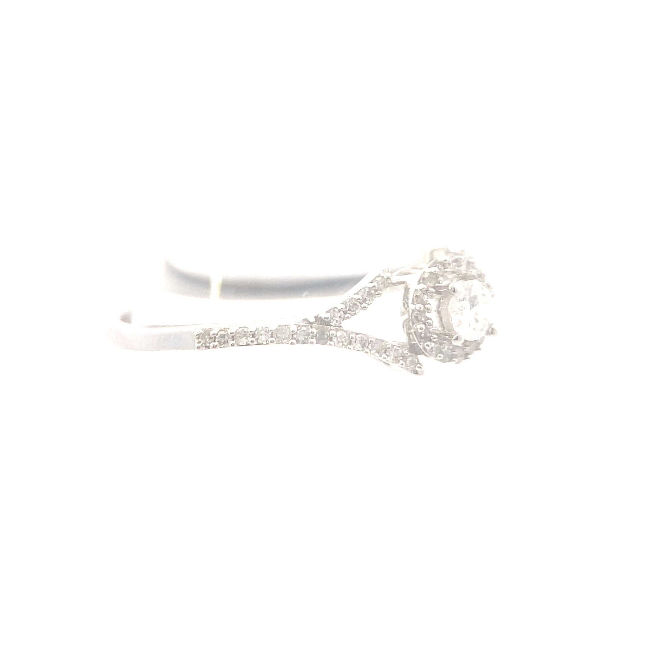 The "Ellie" — 10K White Gold 1/4CTW. Diamond Halo Engagement Ring