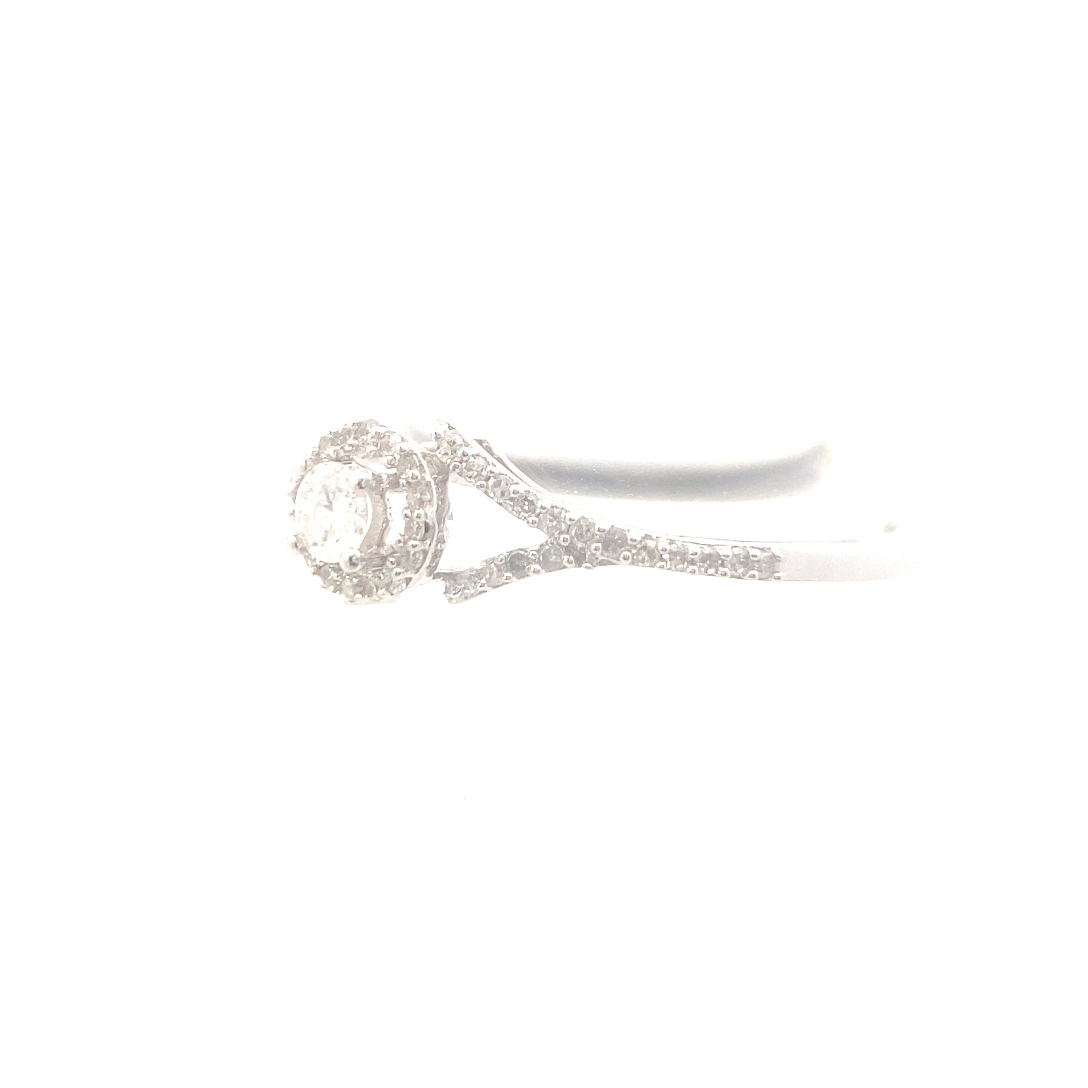 The "Ellie" — 10K White Gold 1/4CTW. Diamond Halo Engagement Ring