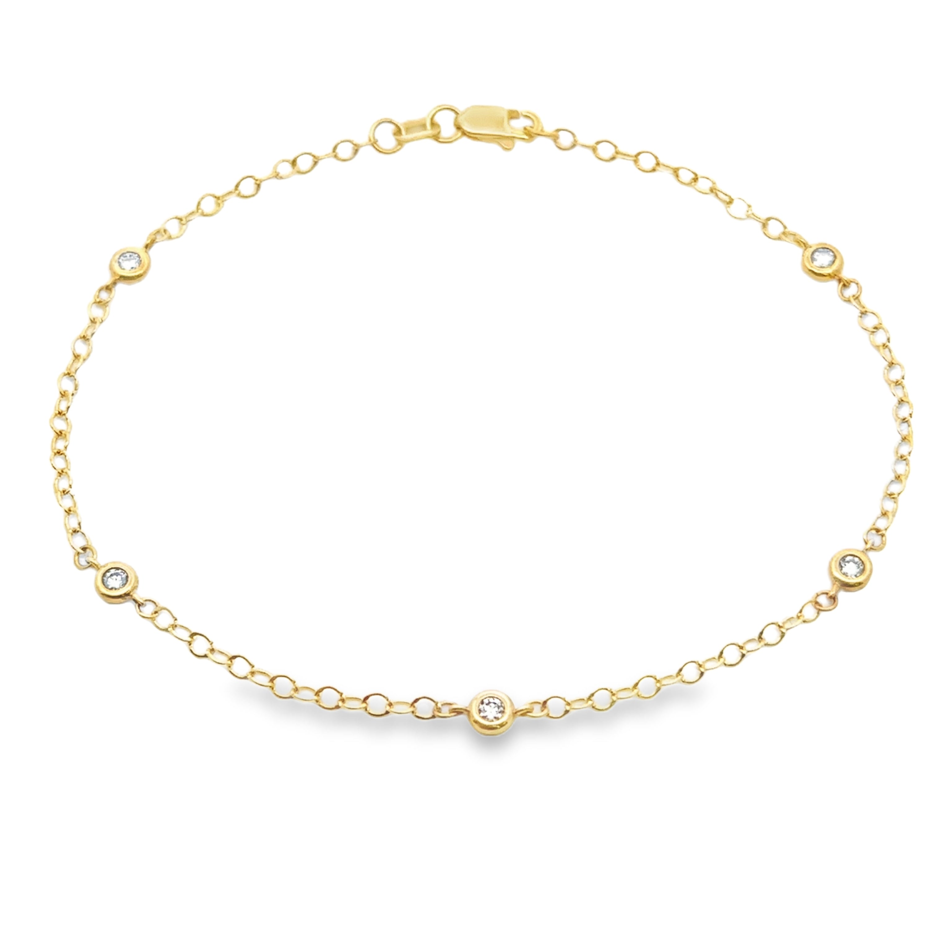 14K Yellow Gold 1/8CTW. Diamond Station Bracelet on a white background