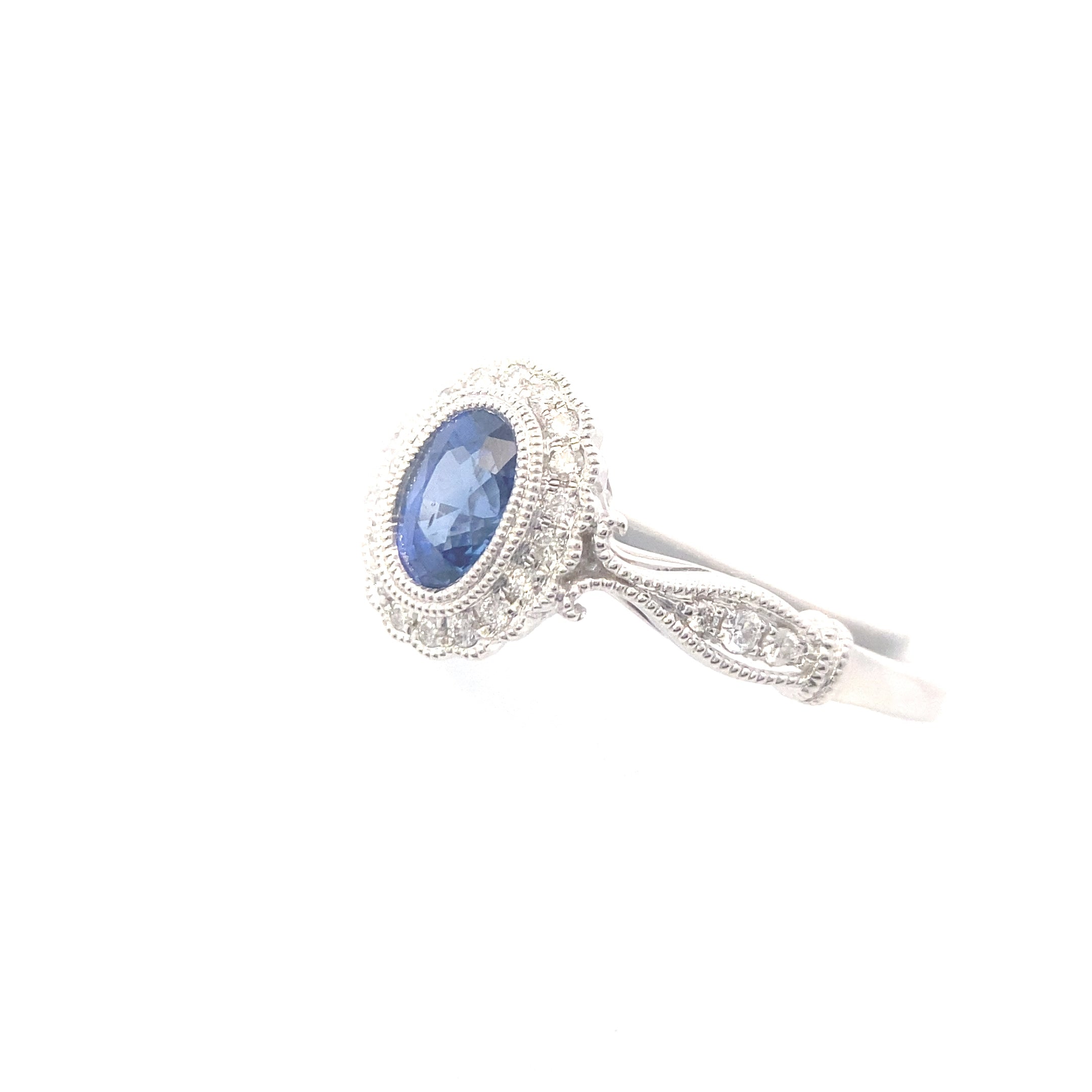 14K White Gold Vintage-Inspired Oval Sapphire and 1/6CT. Diamond Ring