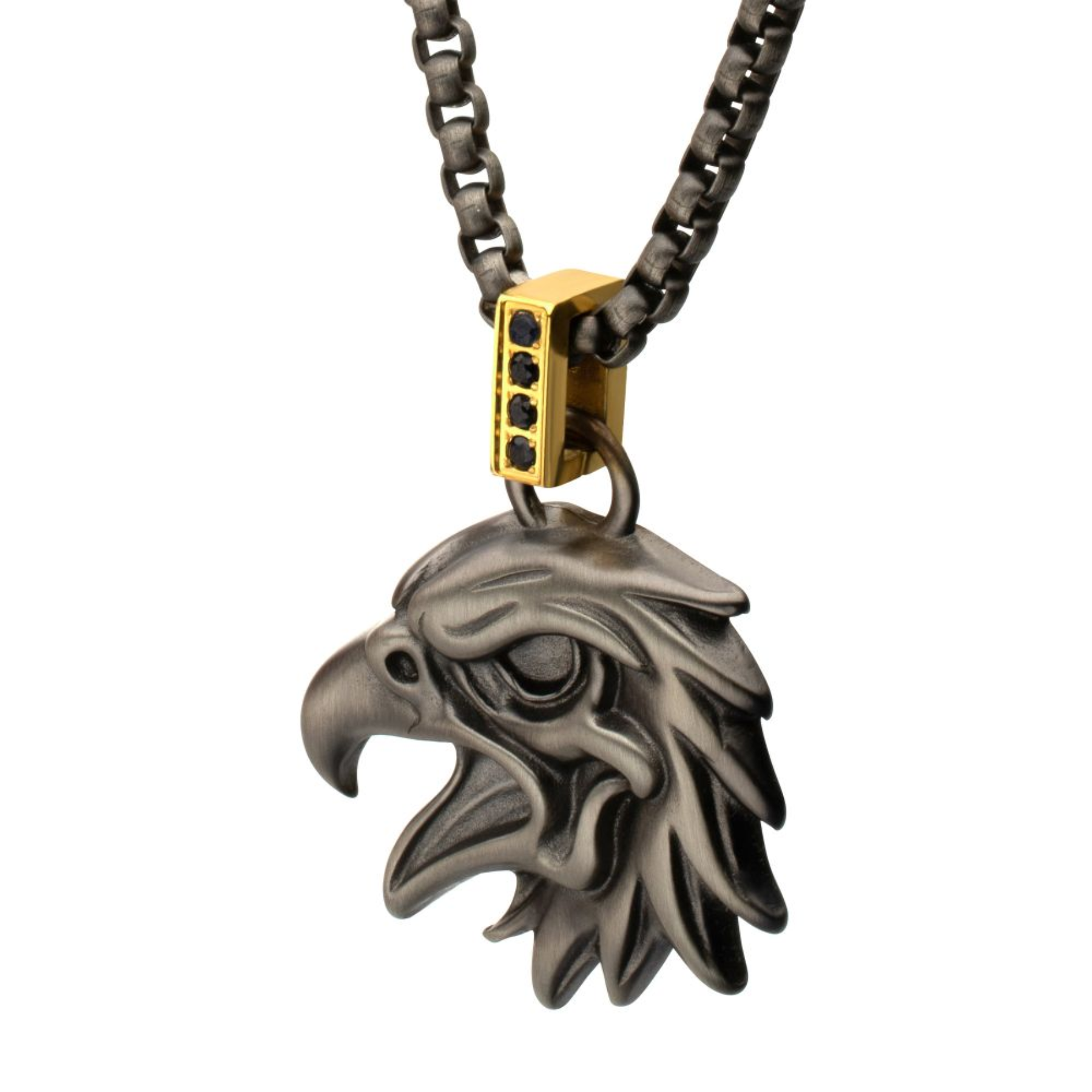 Eagle head pendant on a chain with gold accent on a white background
