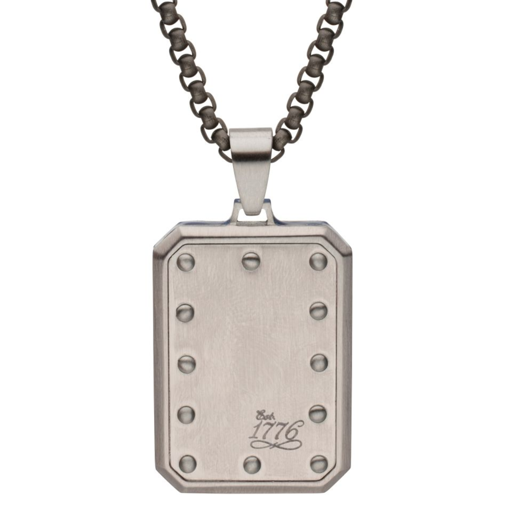 Silver dog tag pendant with engraved text on a white background