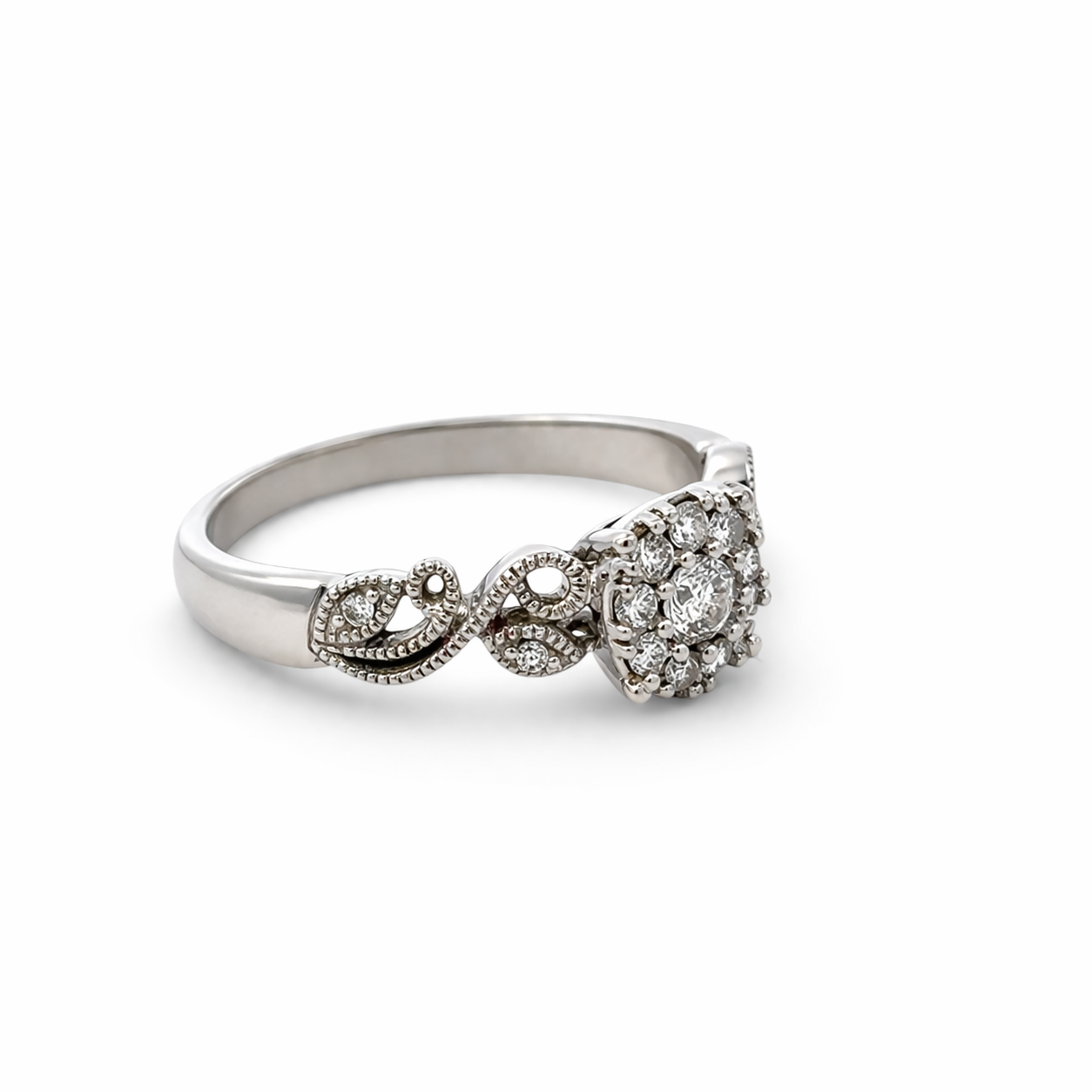 Estate Collection: 10K White Gold 0.13CTW. Natural Diamond Halo Engagement Ring