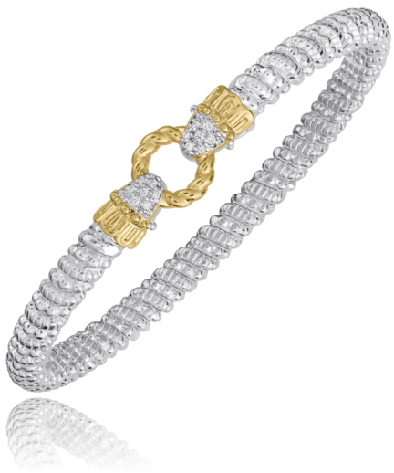 Silver and gold bracelet on a white background