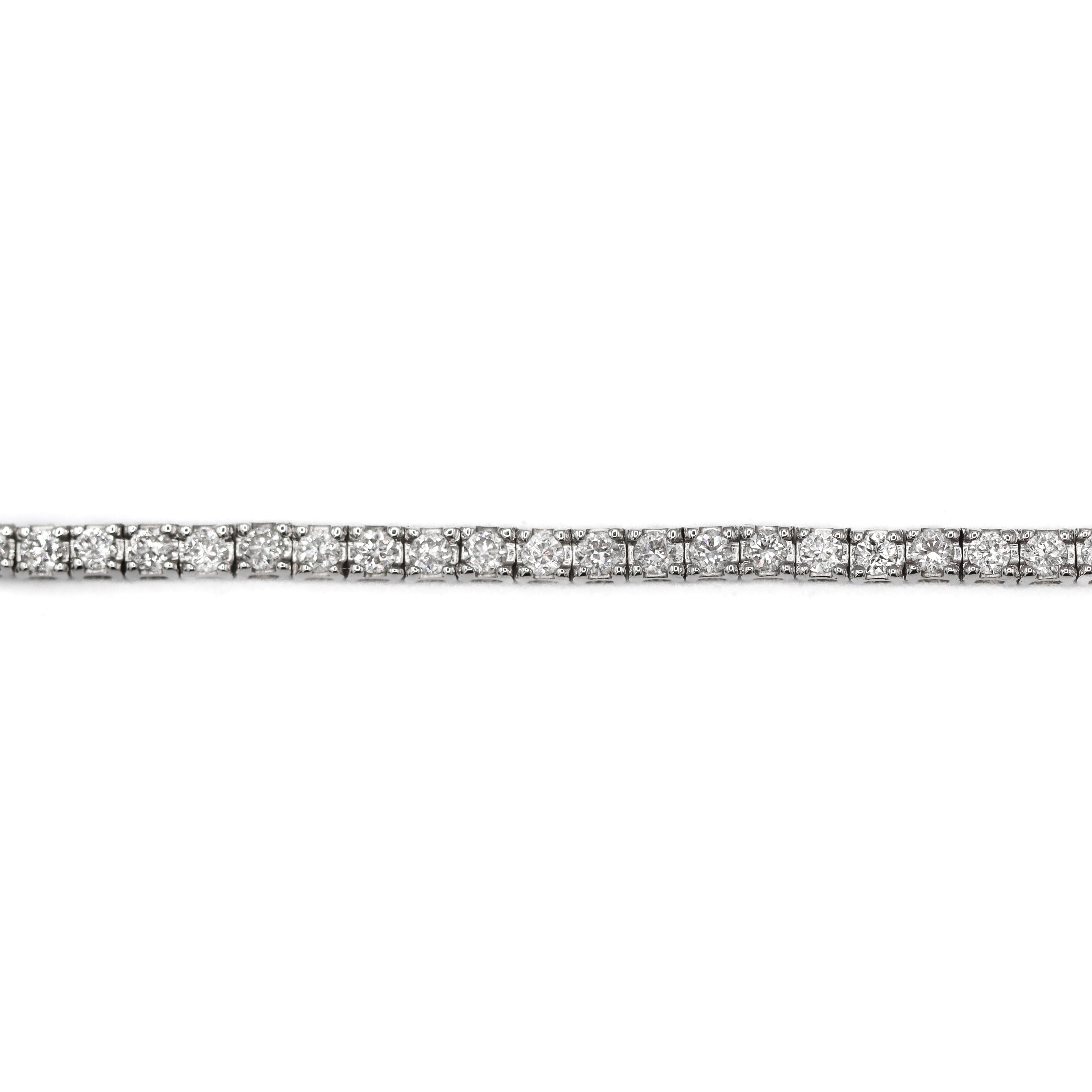 Straight close up view of the diamond links on this Side view zoomed out of 14K White Gold 1CTW. Lab-Grown Diamond Tennis Bracelet on a white background.
