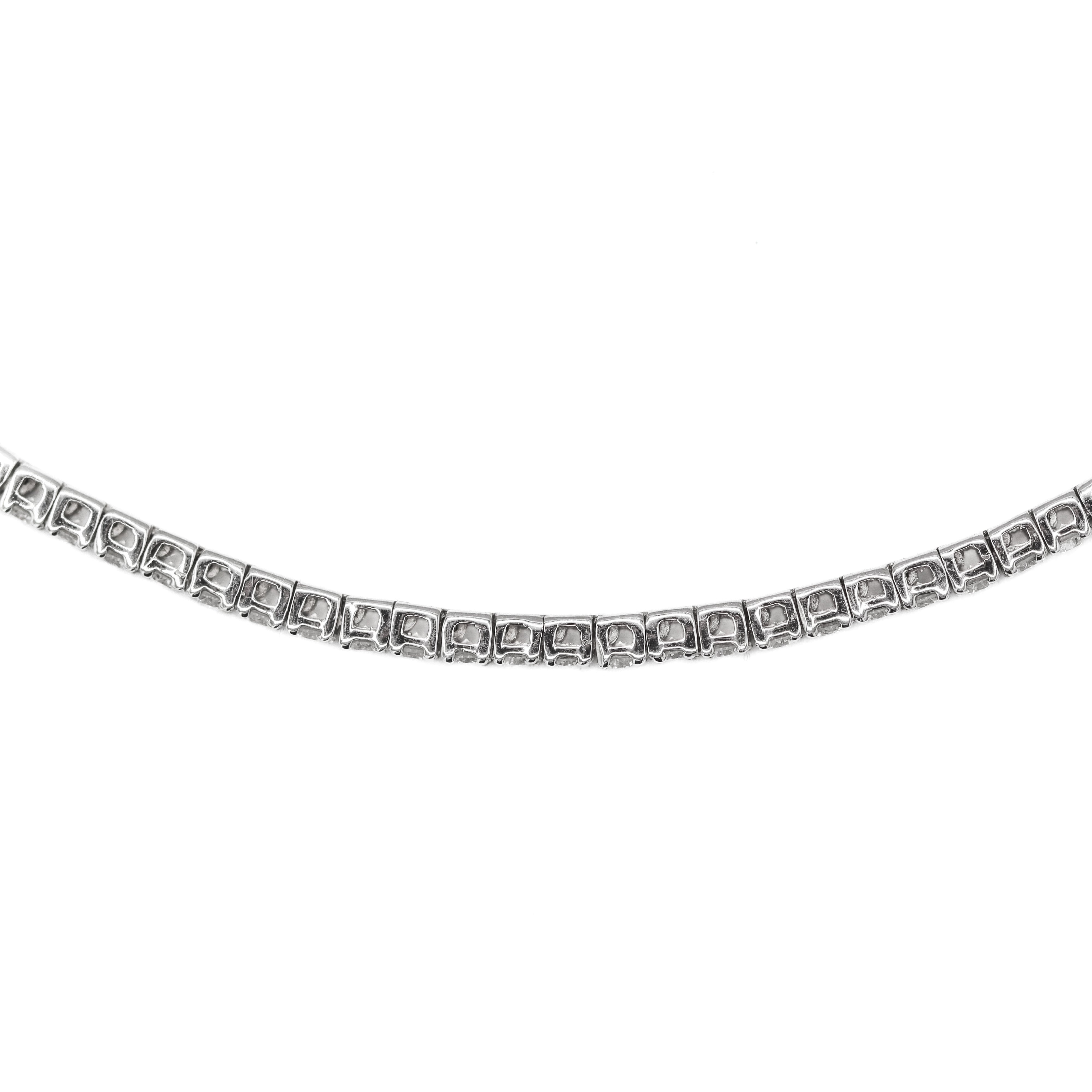Side view zoomed in showing the basket link style of this Side view zoomed out of 14K White Gold 1CTW. Lab-Grown Diamond Tennis Bracelet on a white background.