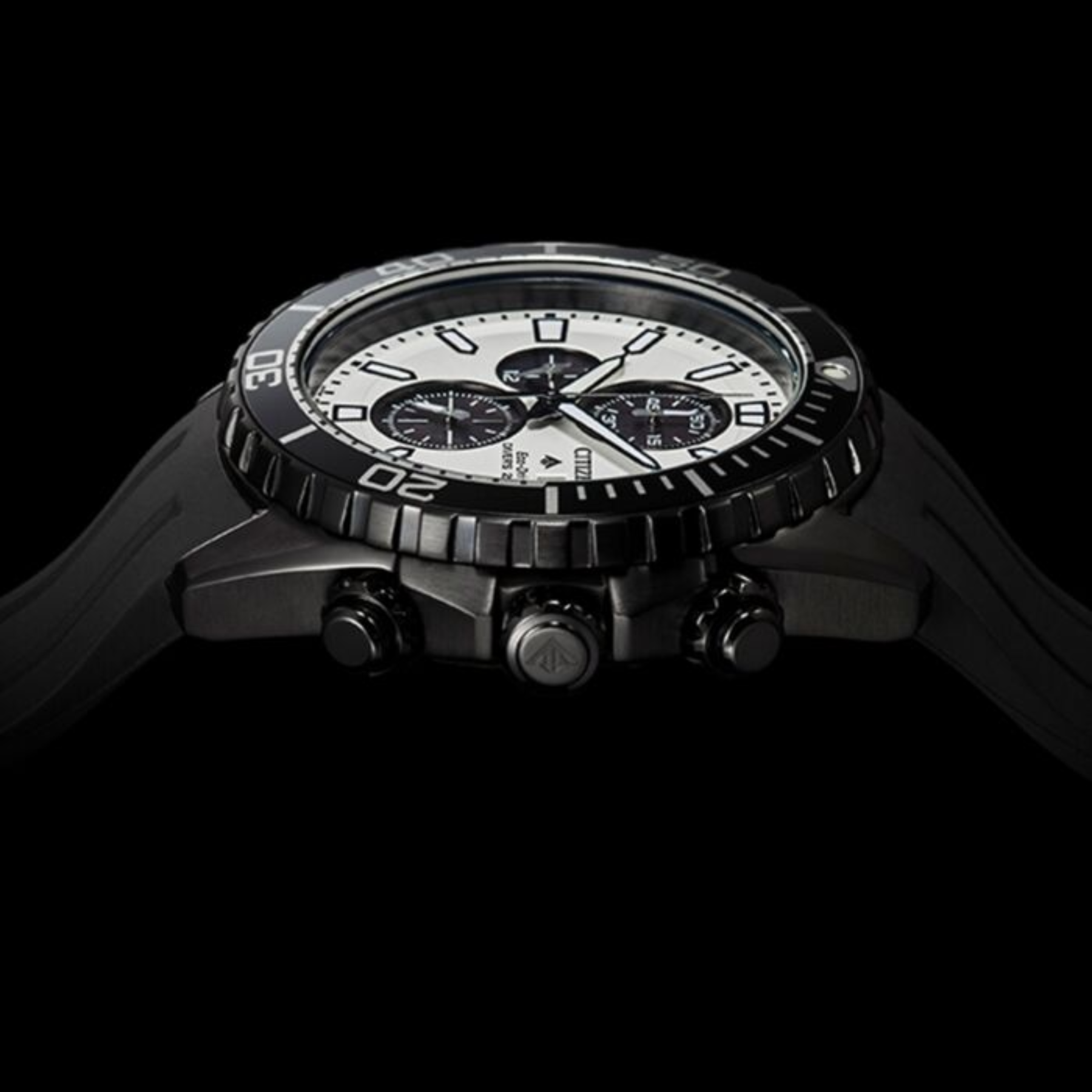 Black wristwatch with a detailed face on a black background