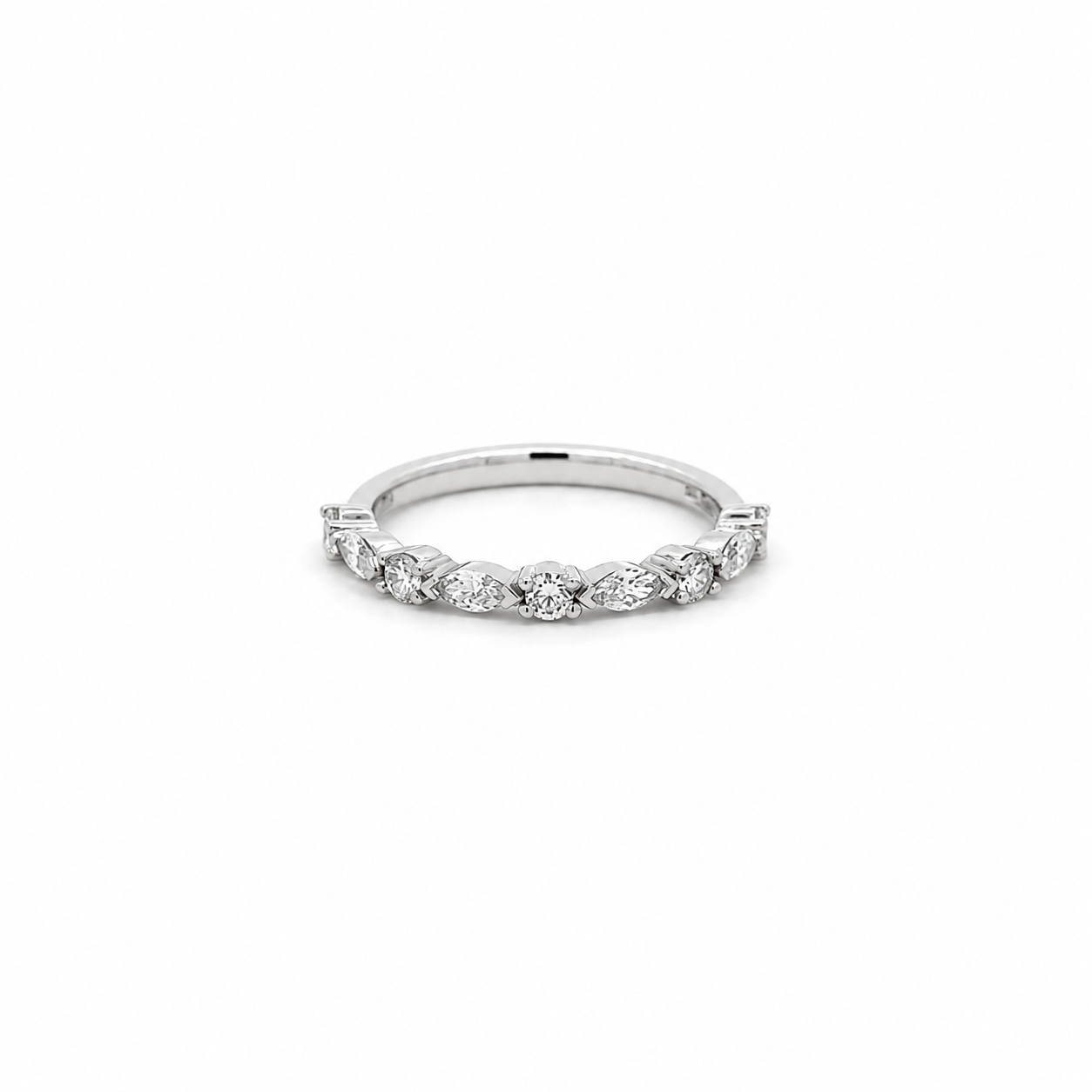 A silver diamond band ring featuring a row of marquise-cut diamonds set in a polished silver-colored band, shown against a plain white background.