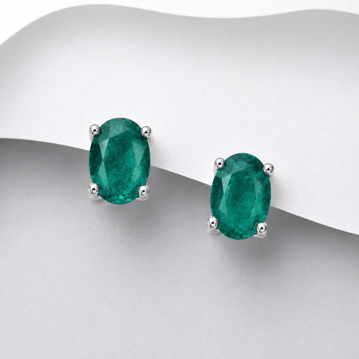 Sterling Silver Emerald Oval Solitaire Stud Earrings