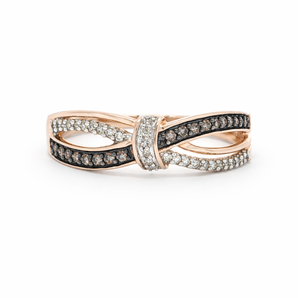 Rose gold and black diamond ring on a white background