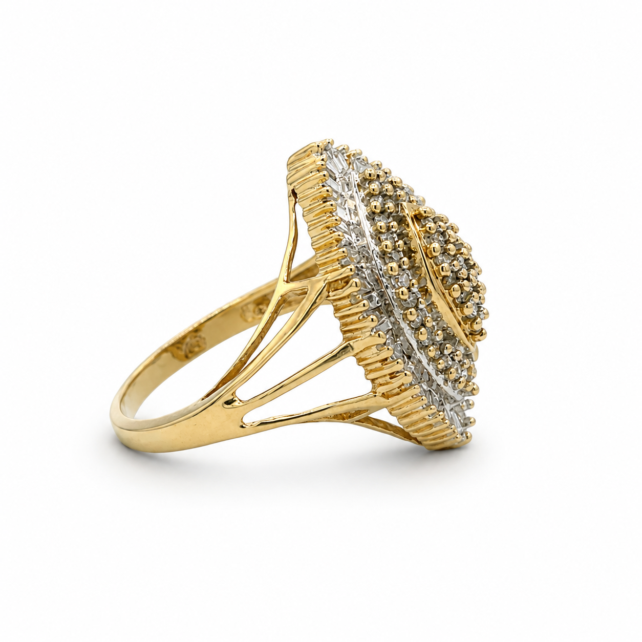 Gold ring with diamond accents on a white background