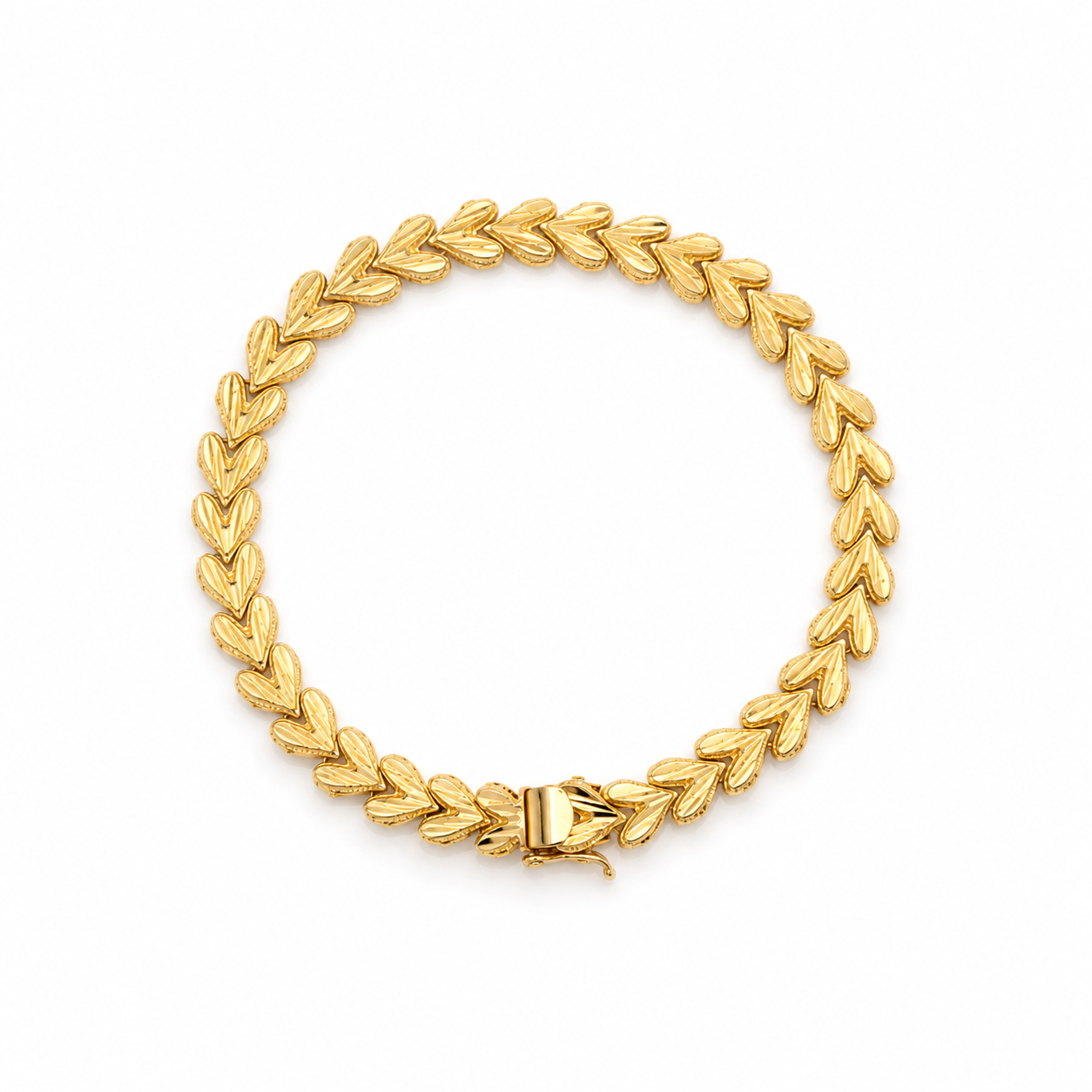 heart link gold bracelet on a white background
