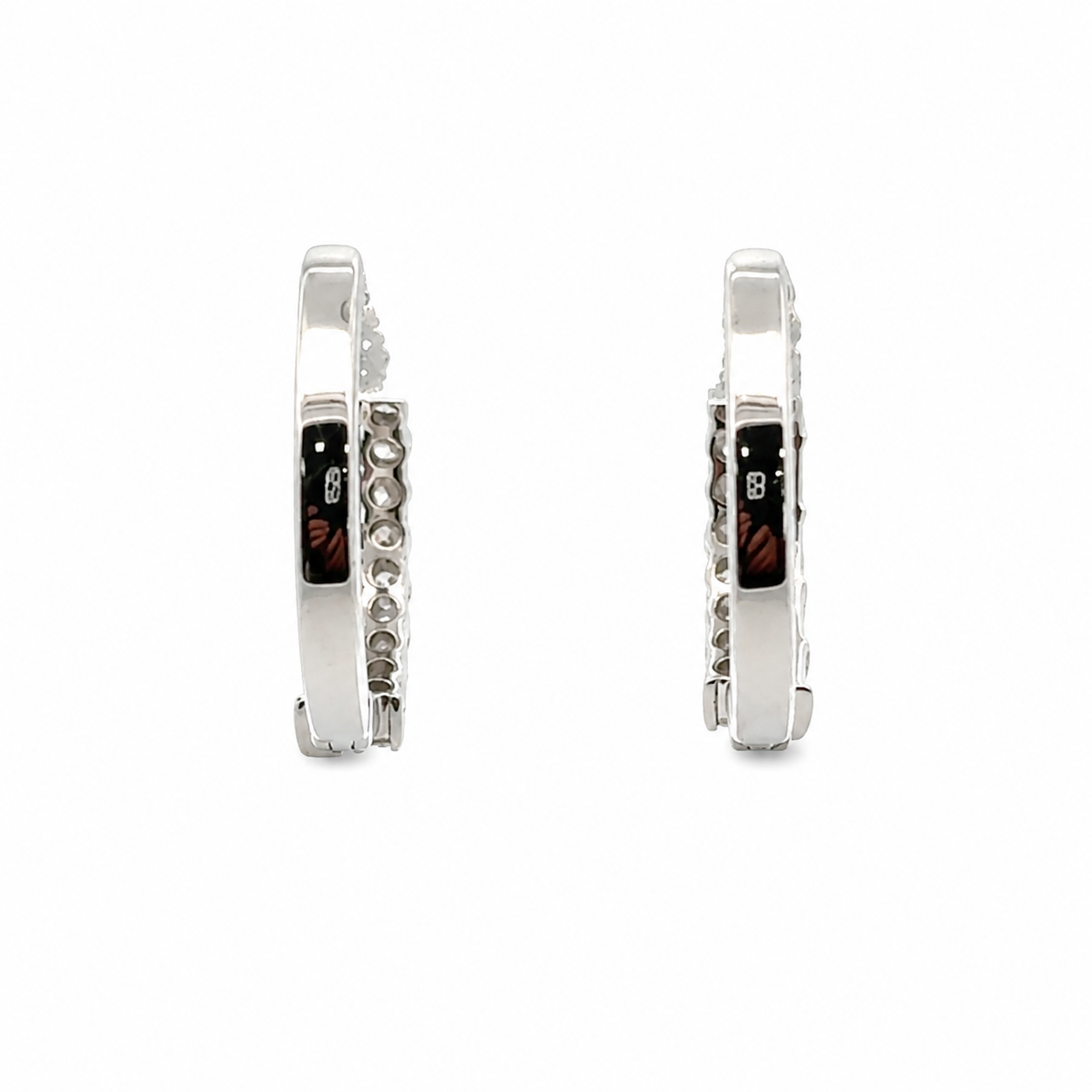 Back view of earrings on a white background