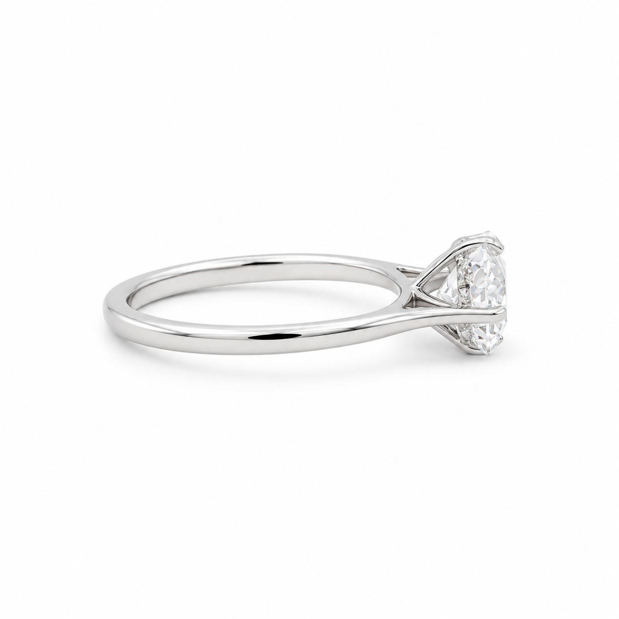 Gold ring with embedded diamonds on a white background