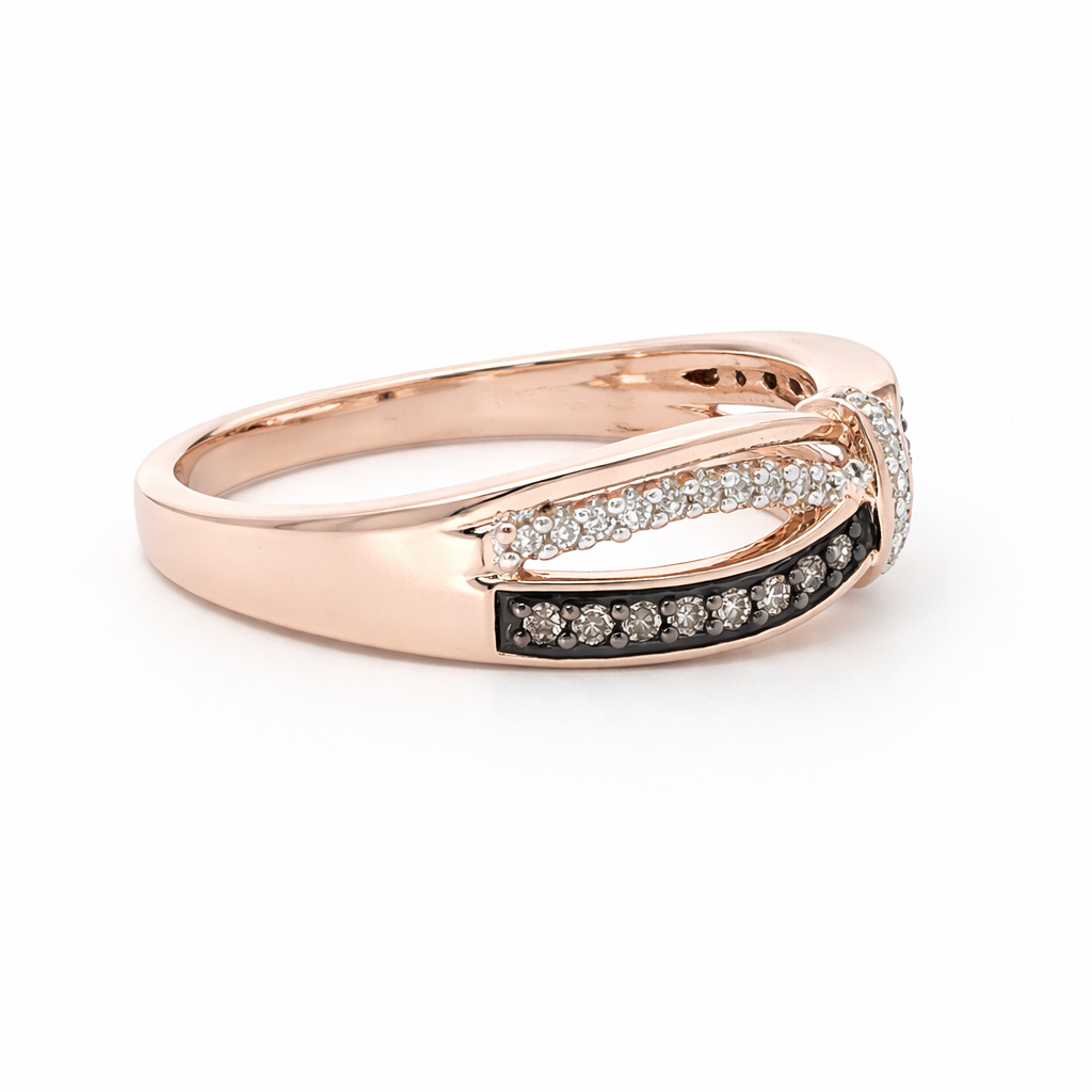Rose gold ring with diamond accents on a white background