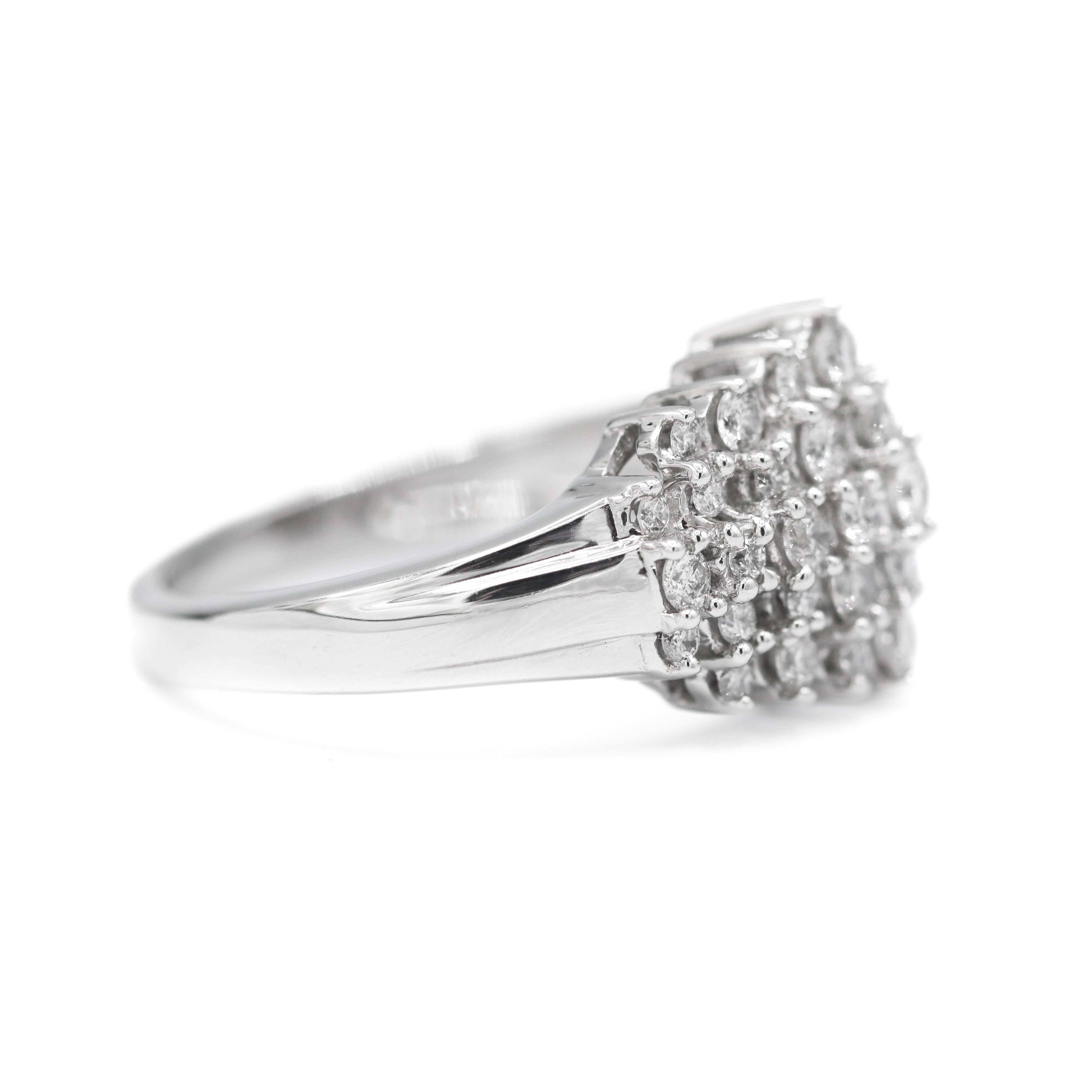 Side View of 10K White Gold 1CTW. Diamond Cluster Cocktail Ring on a white background