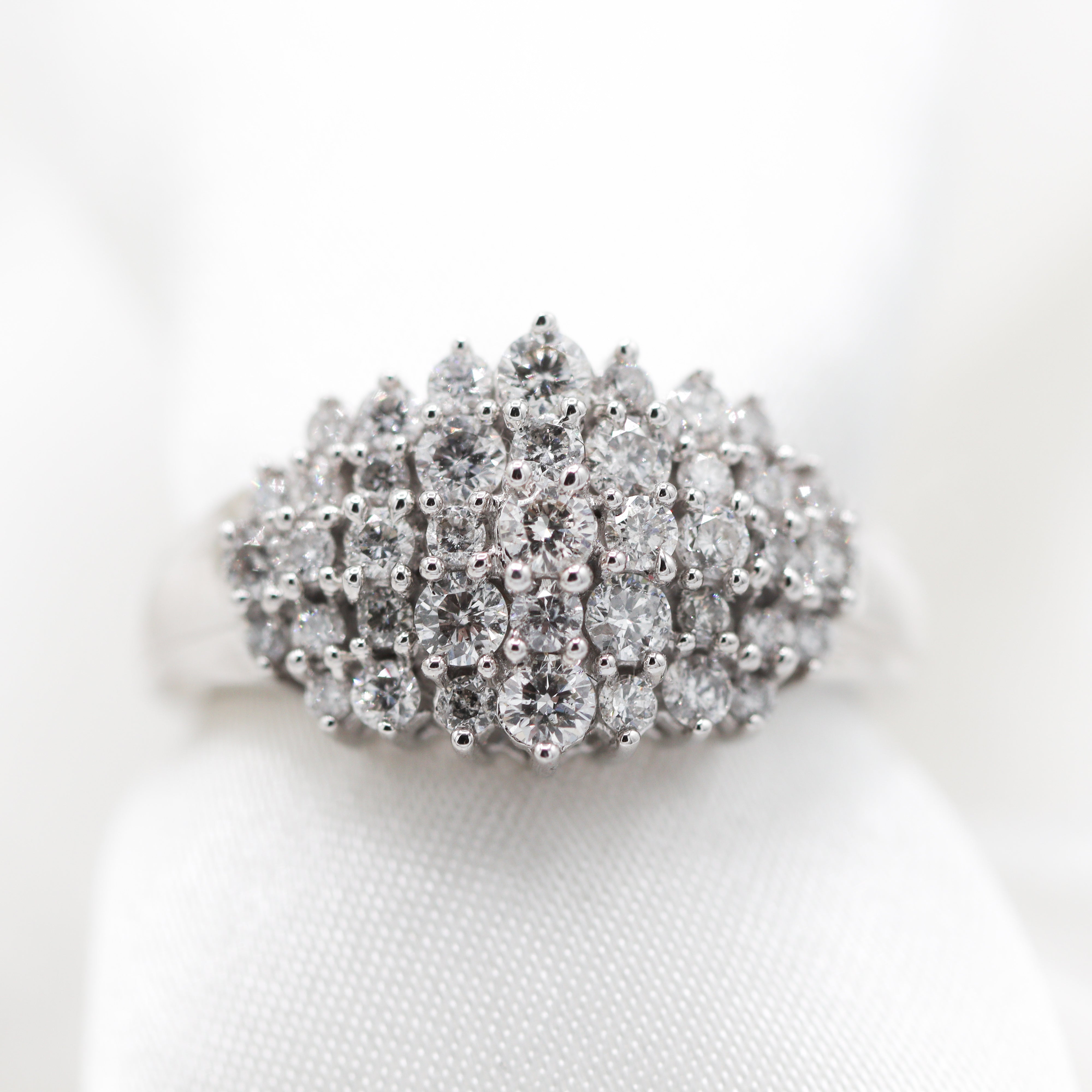 Front View of 10K White Gold 1CTW. Diamond Cluster Cocktail Ring on satin