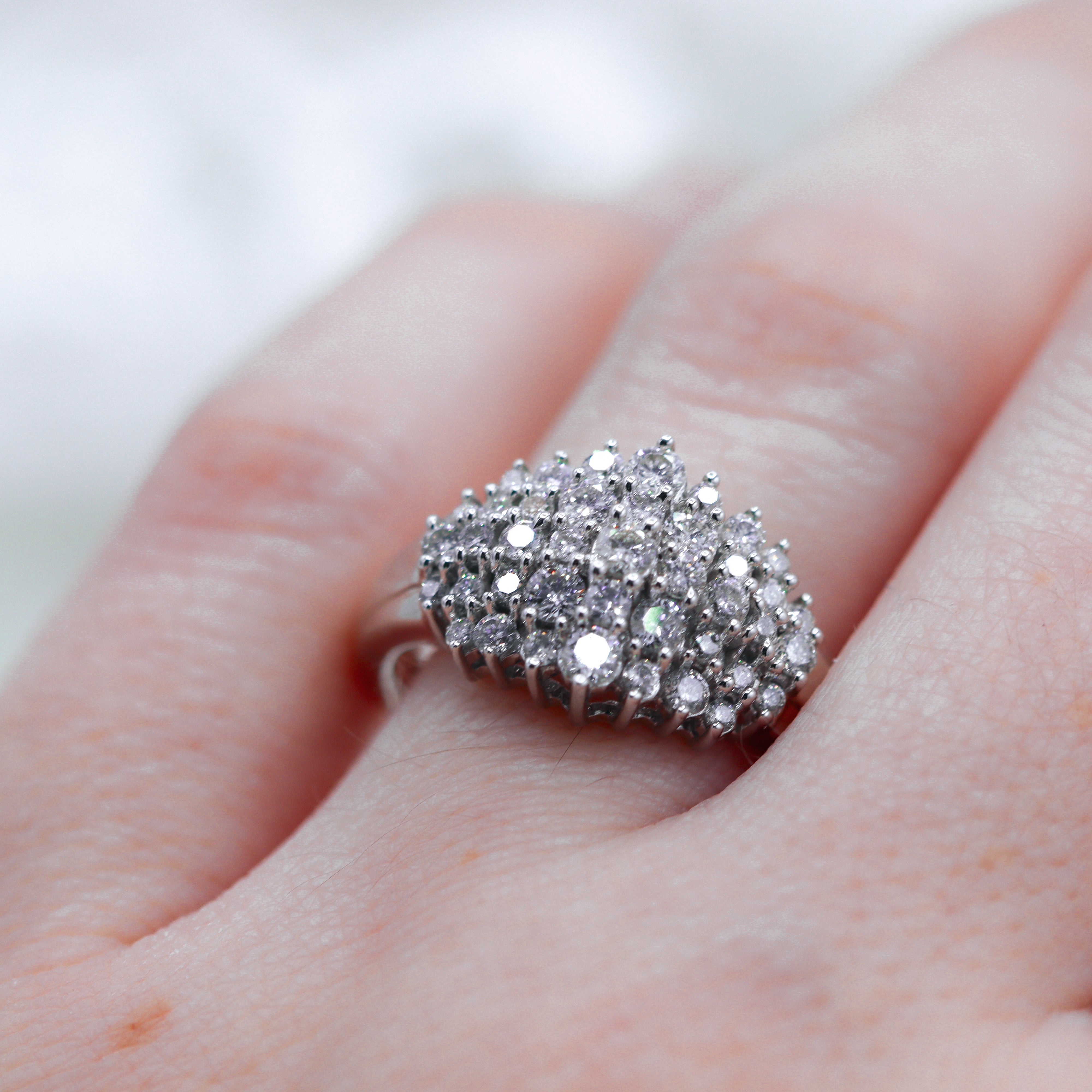 10K White Gold 1CTW. Diamond Cluster Cocktail Ring on a hand
