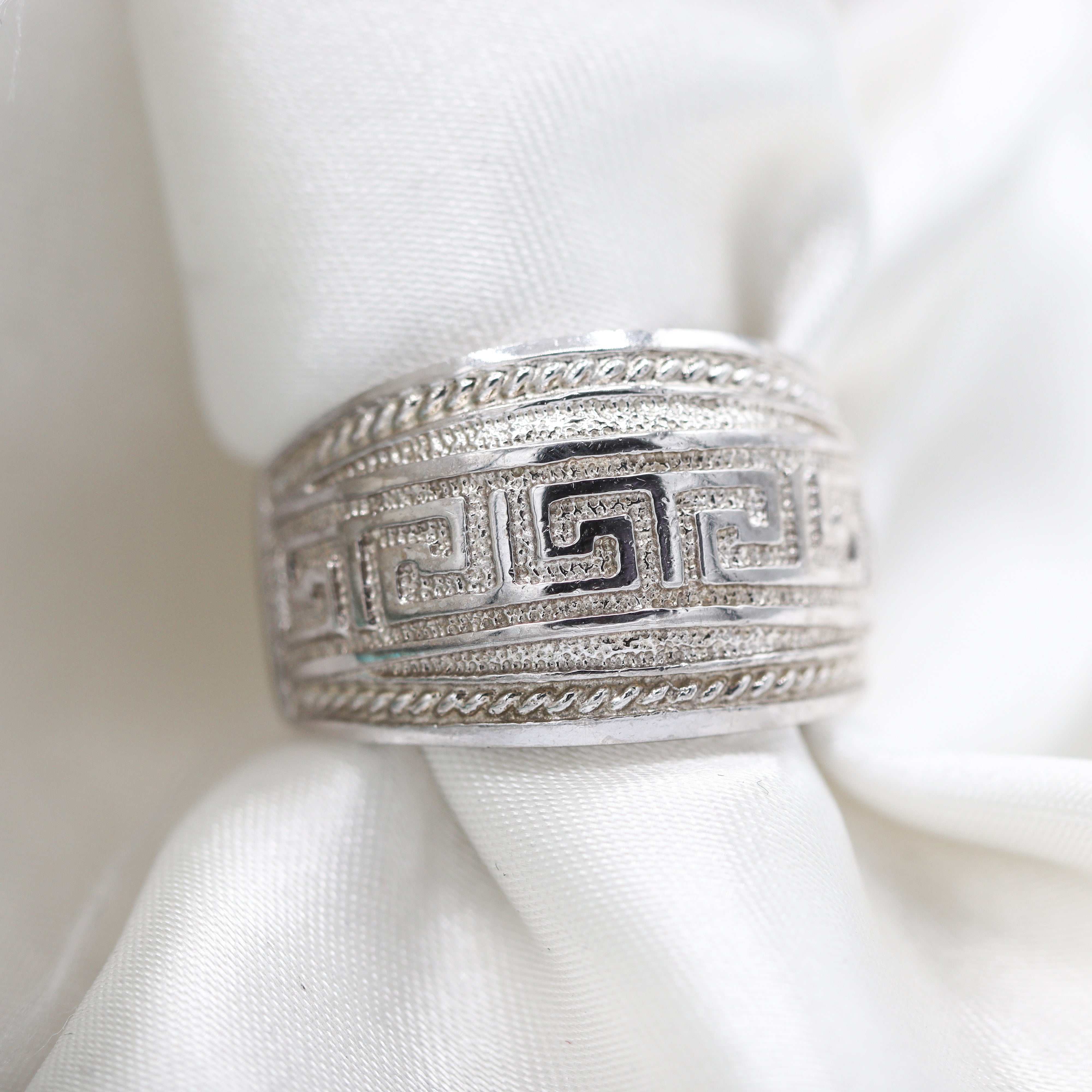 14K White Gold Greek Spiral Design Tapered Accent Ring on satin