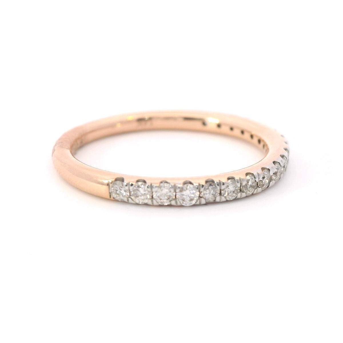 Side view of 14K Rose Gold 3/8CT. Diamond Half-Eternity Band on white background.