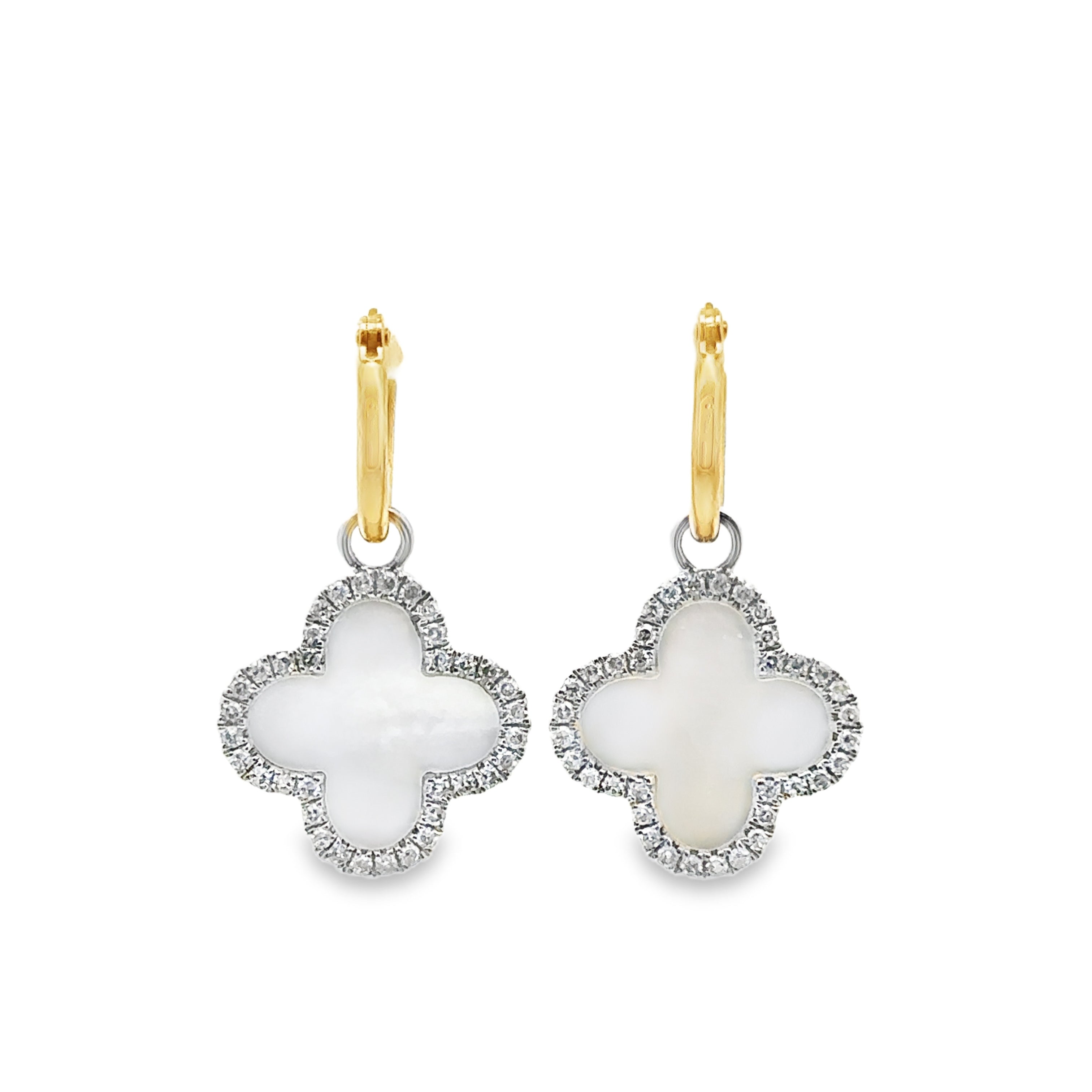 Front view of Mother of pearl and single-cut diamond dangle stud earrings on a white background.