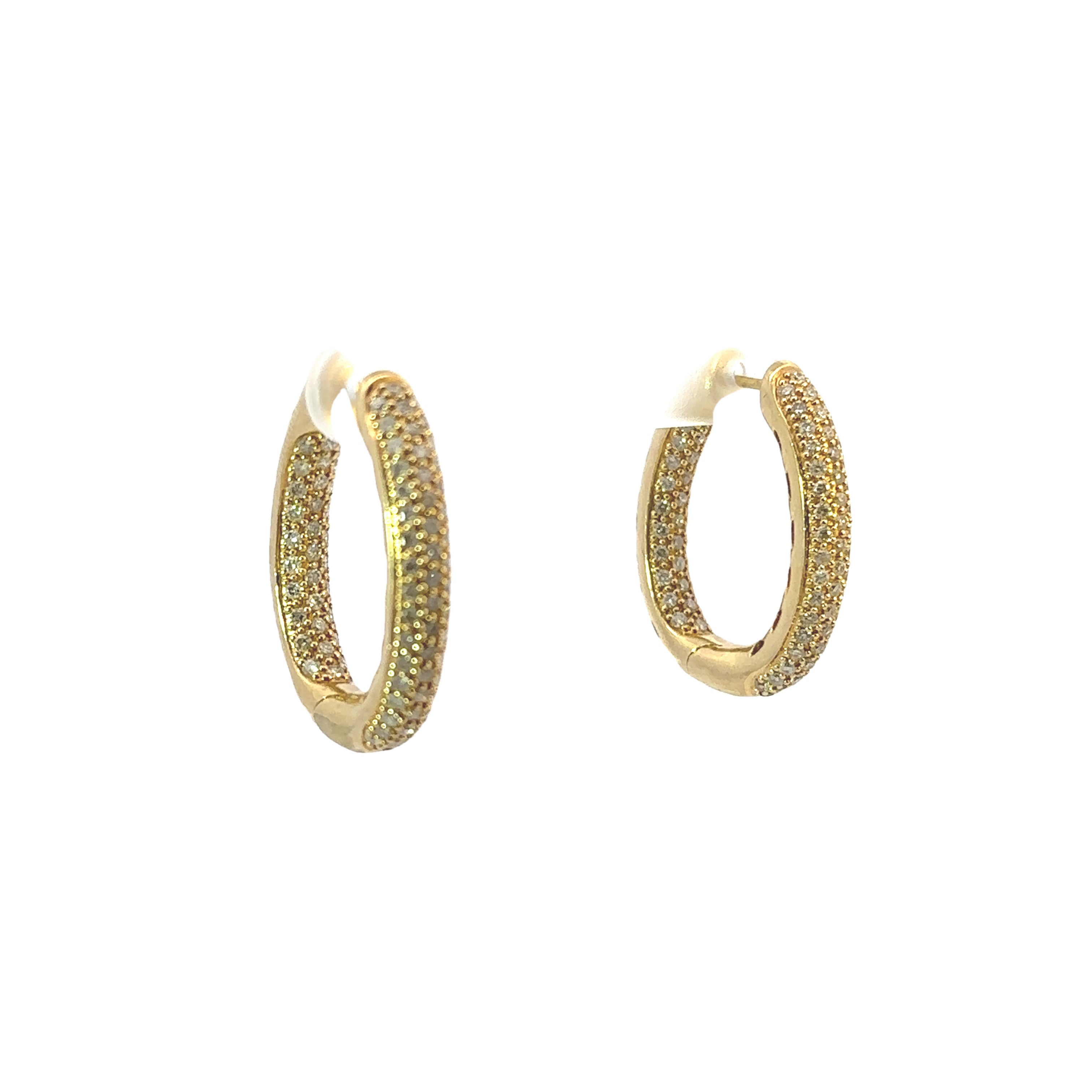 Gold hoop earrings on a white background
