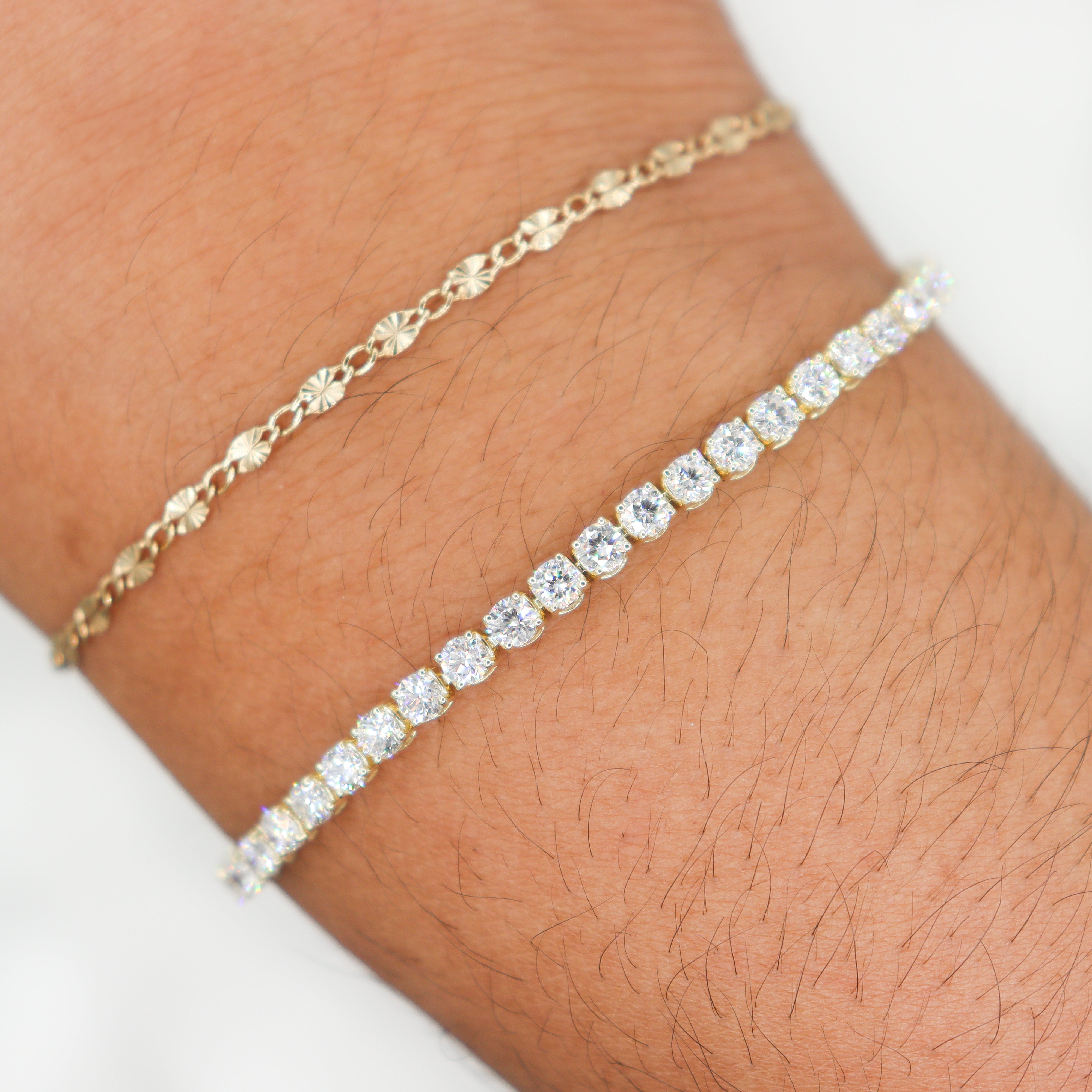 10K Yellow Gold 5CTW. Lab-Grown Diamond Tennis Bracelet on a wrist