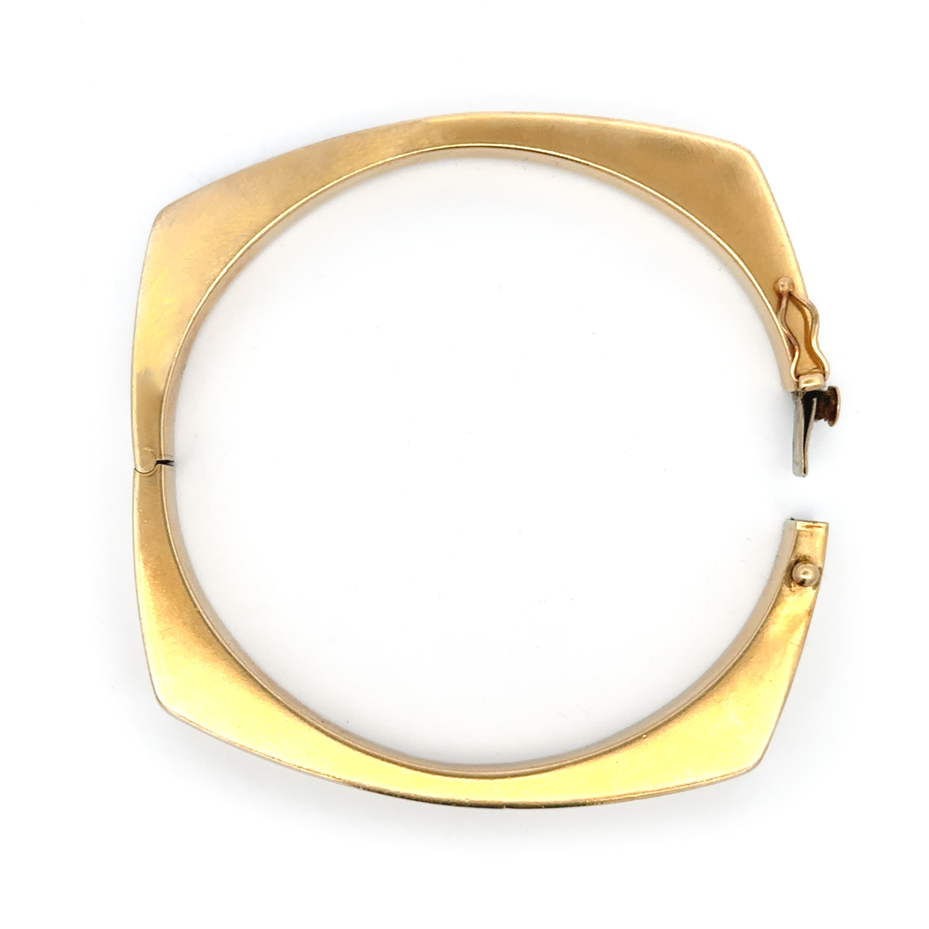 Yellow Gold bangle on a white background