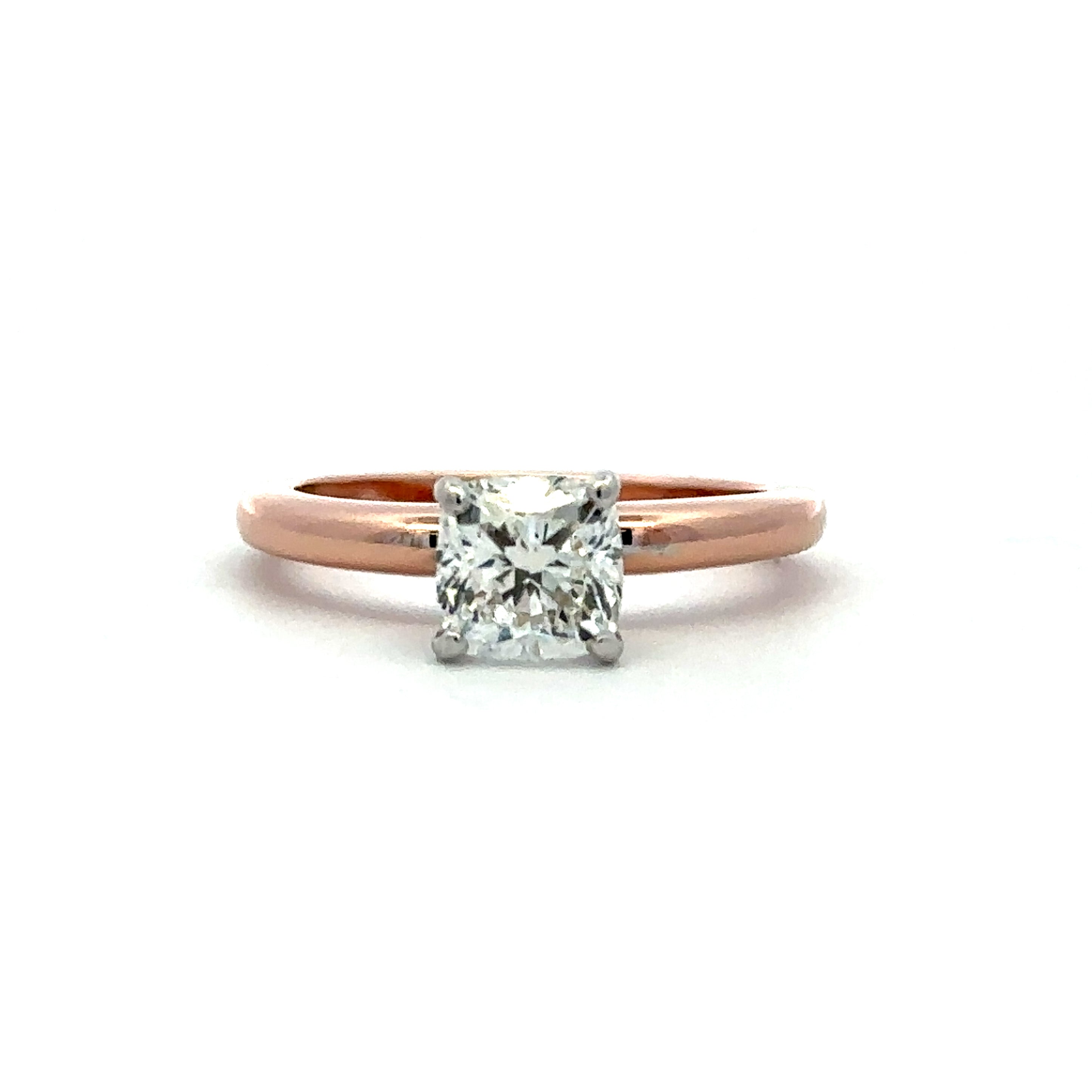 Rose Gold engagement ring on a white background