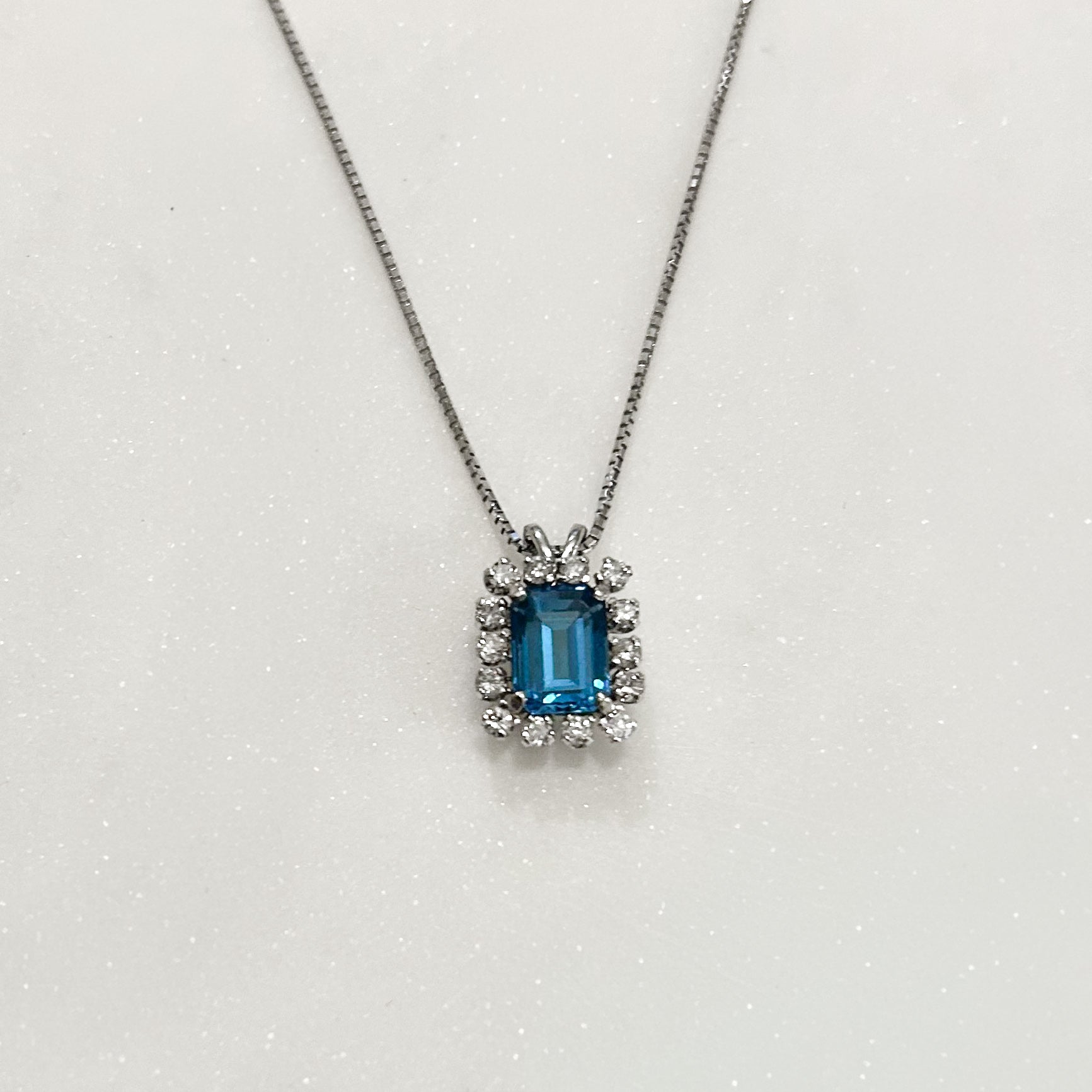 Estate Collection: 14K White Gold Emerald-Cut Blue Topaz & Diamond Halo Pendant Necklace