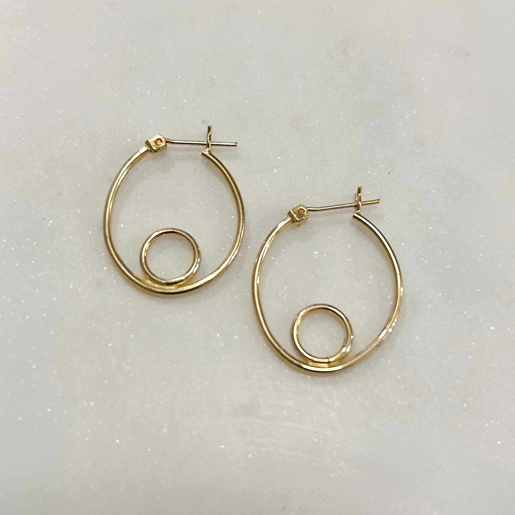 Estate Collection: 14K Yellow Gold Oval Hoop Earrings with Circle Addition
