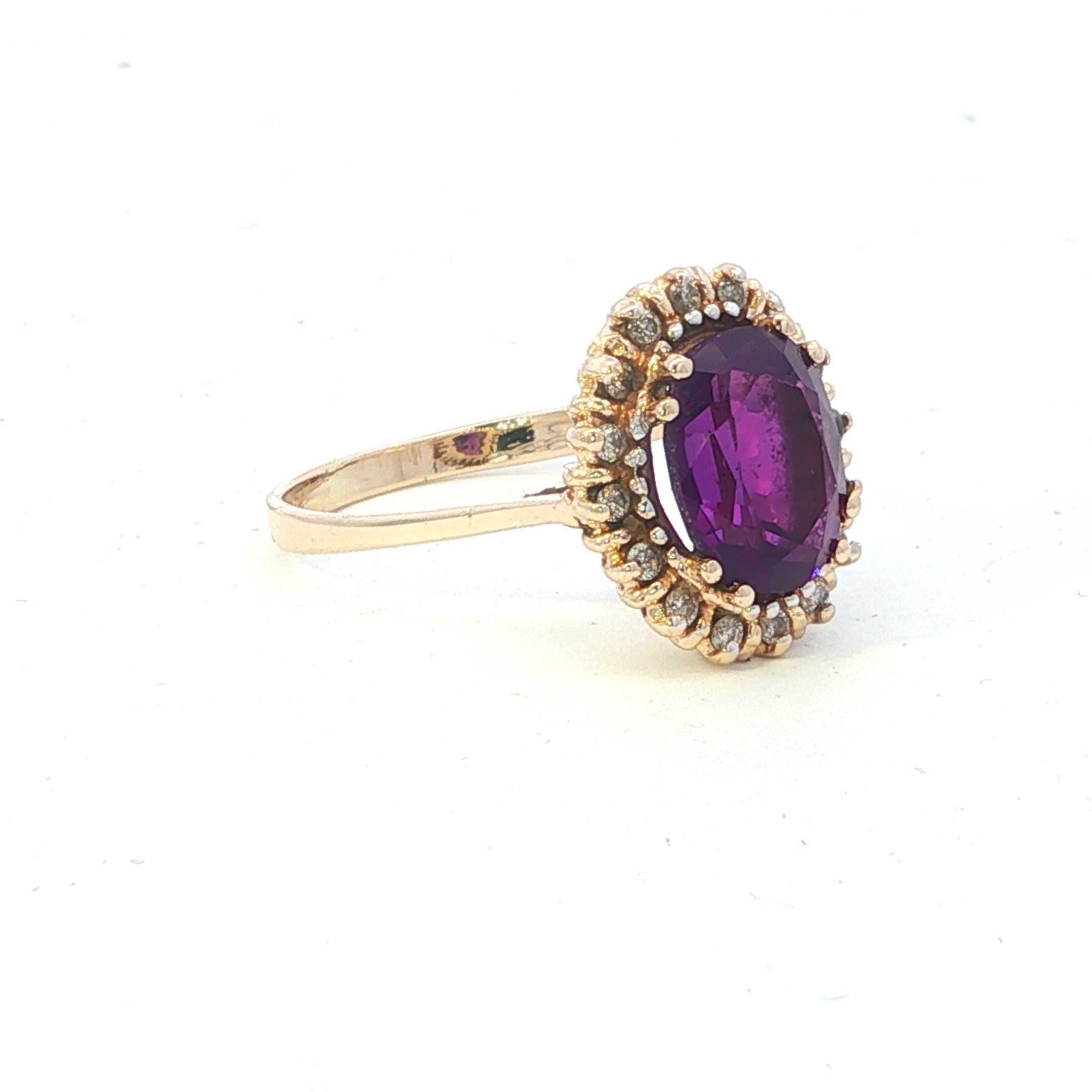 Estate Collection: 10K Yellow Gold Oval Amethyst Ring With Halo Diamond Accents