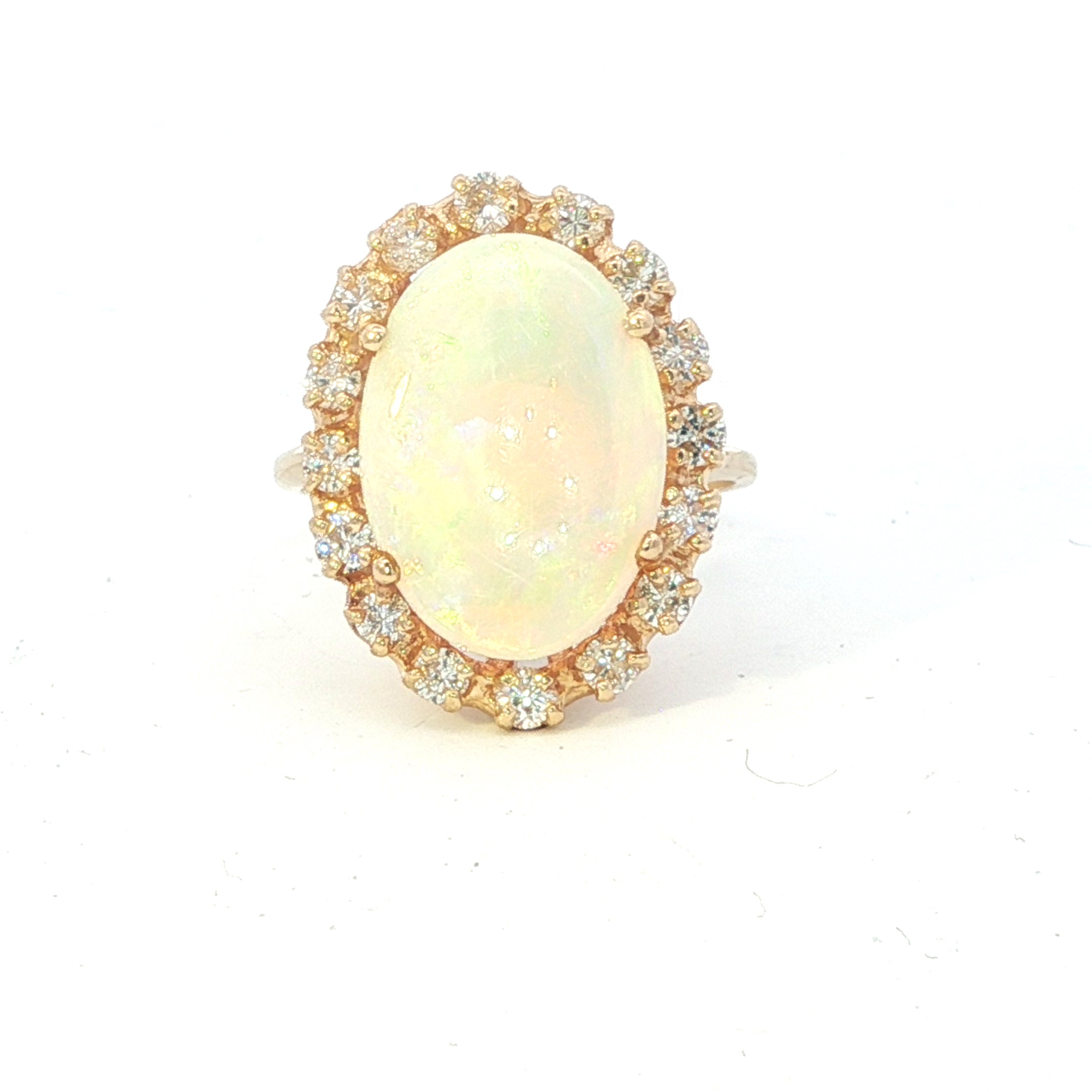 Estate Collection: 14K Yellow Gold Oval White Opal and Diamond Halo Cocktail Ring