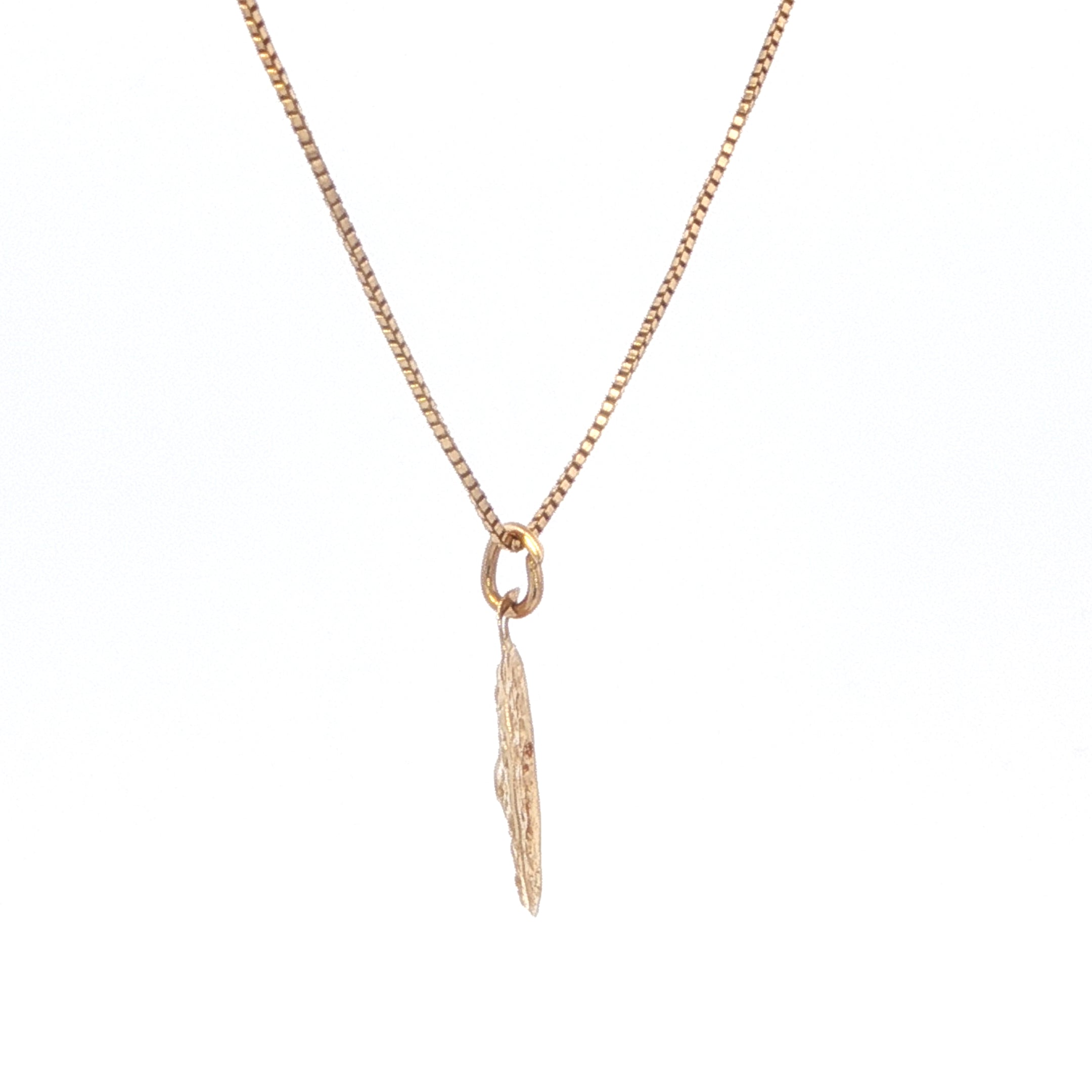 Rose gold necklace with a feather pendant on a white background