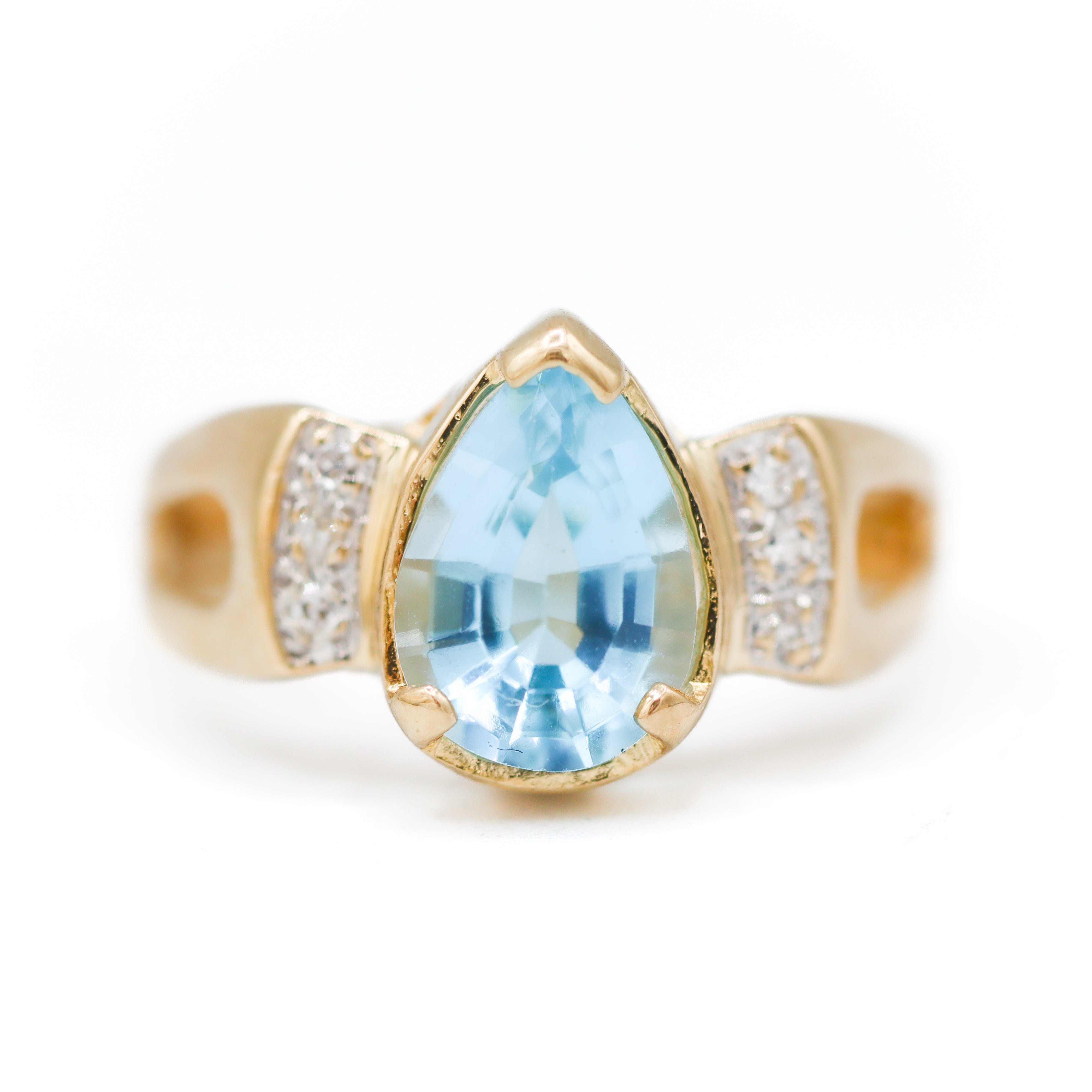 Estate Collection: 14K Yellow Gold Light Blue Pear Center With Diamond Accents