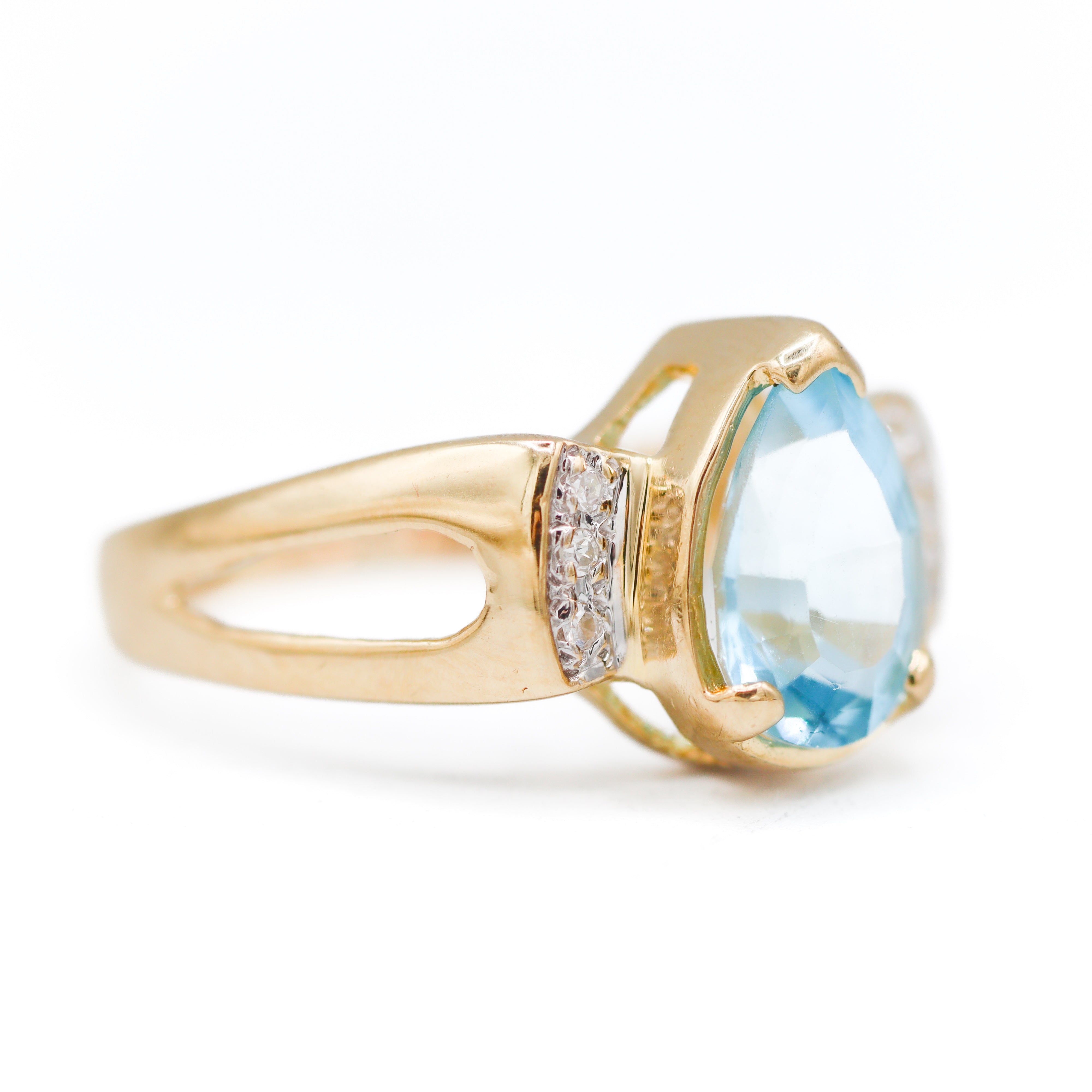 Estate Collection: 14K Yellow Gold Light Blue Pear Center With Diamond Accents